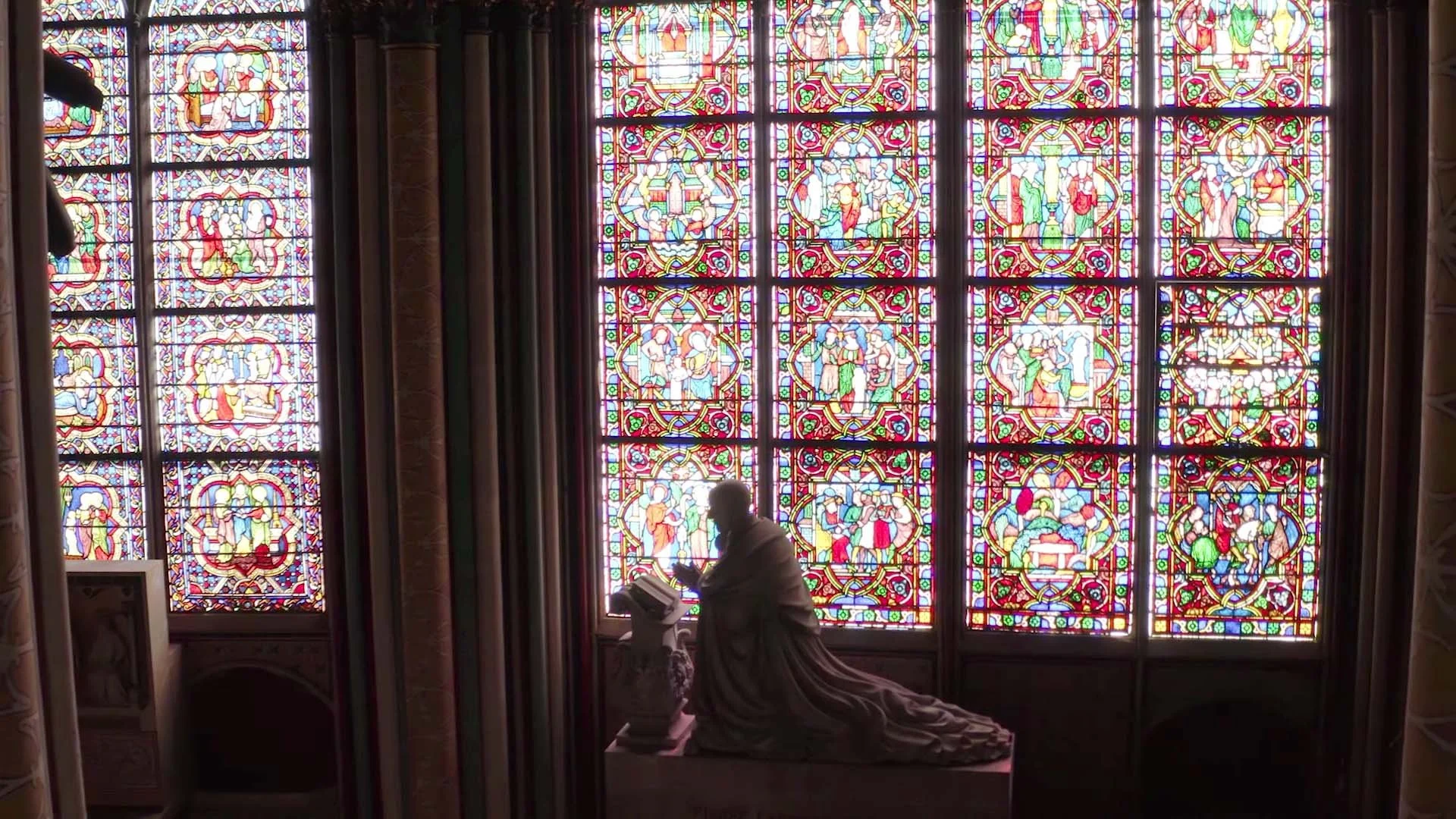 FPV drone view inside Notre-Dame Cathedral in Paris during restoration, showing the historic Gothic architecture, vaulted interior and reconstruction work within the cathedral.