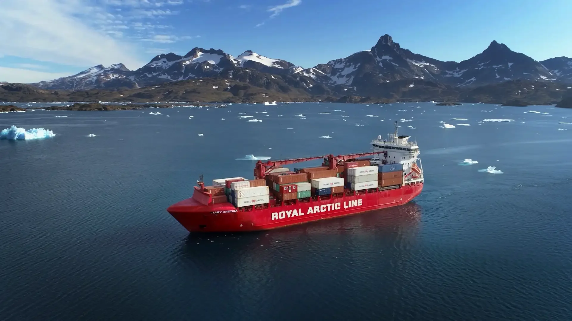Photograph by Lewis Whyld of a Royal Arctic Line container ship heading in to port in Greenland. Whyld has photographed some of the most challenging sites from London to the Arctic.
