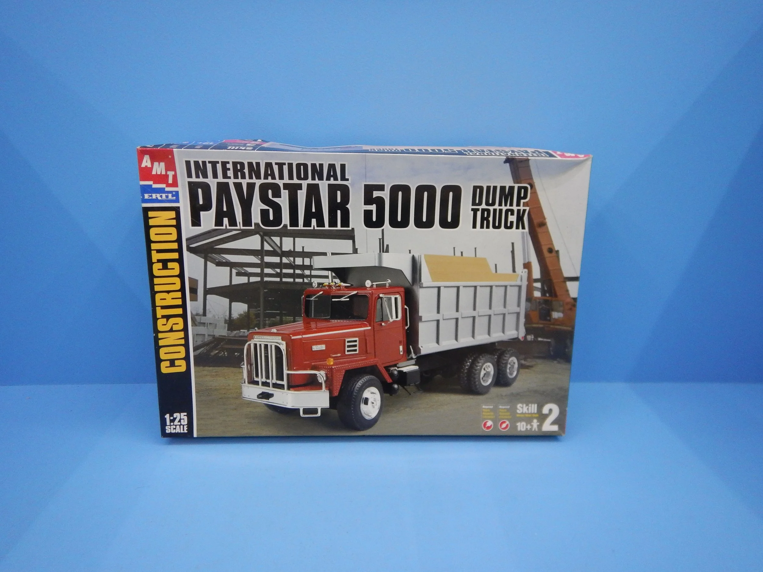 INTERNATIONAL PAYSTAR 5000 DUMP TRUCK, OPEN BOX, INVENTORY MOVED, 31007OBTS1