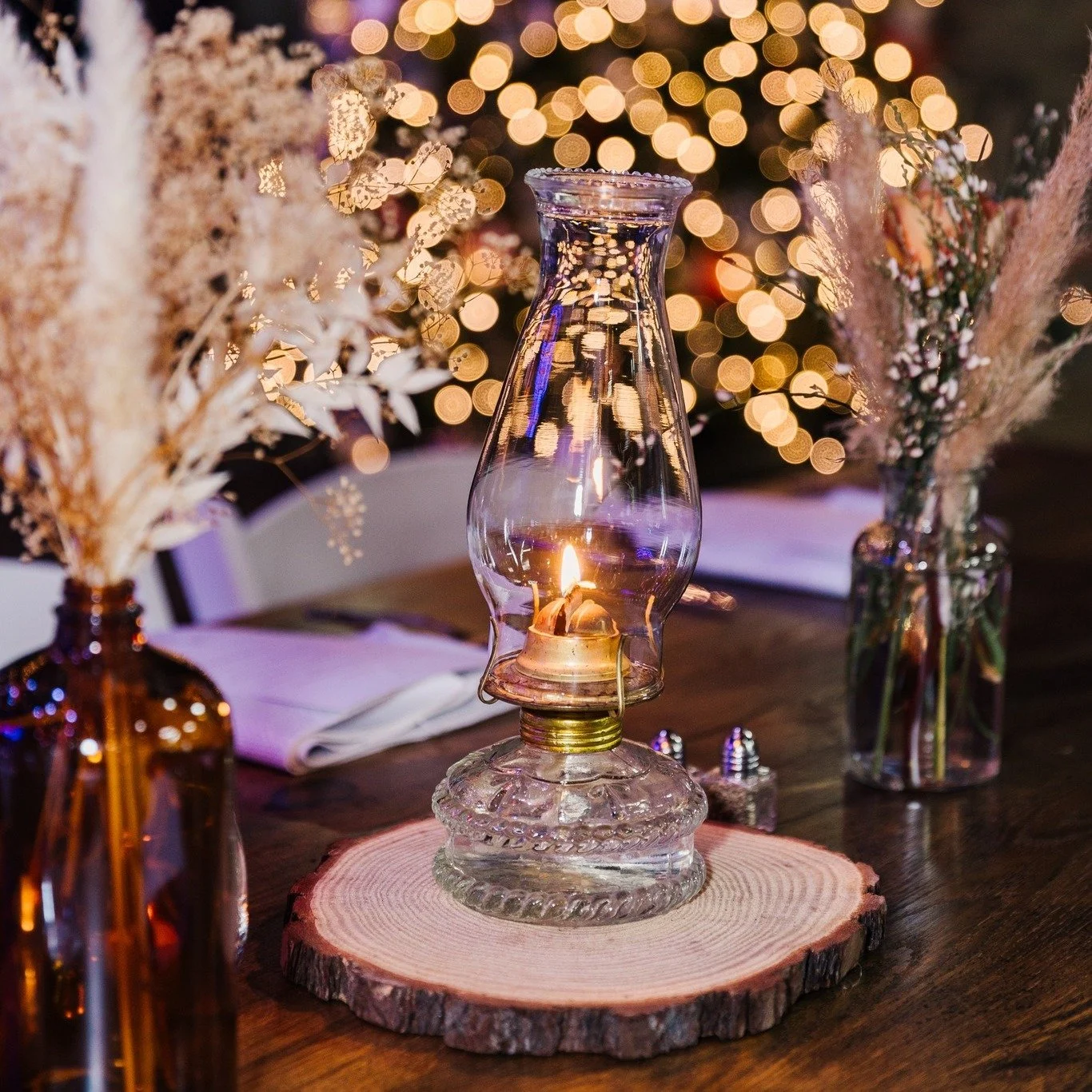 The details that make it feel complete.
From oil lamps to wood slabs and wooden tables, these pieces work together to add warmth, depth, and character to any event.

Photo By: Nicole Marie Photography
Planner: Serendipitous Events
Floral: The Flower 