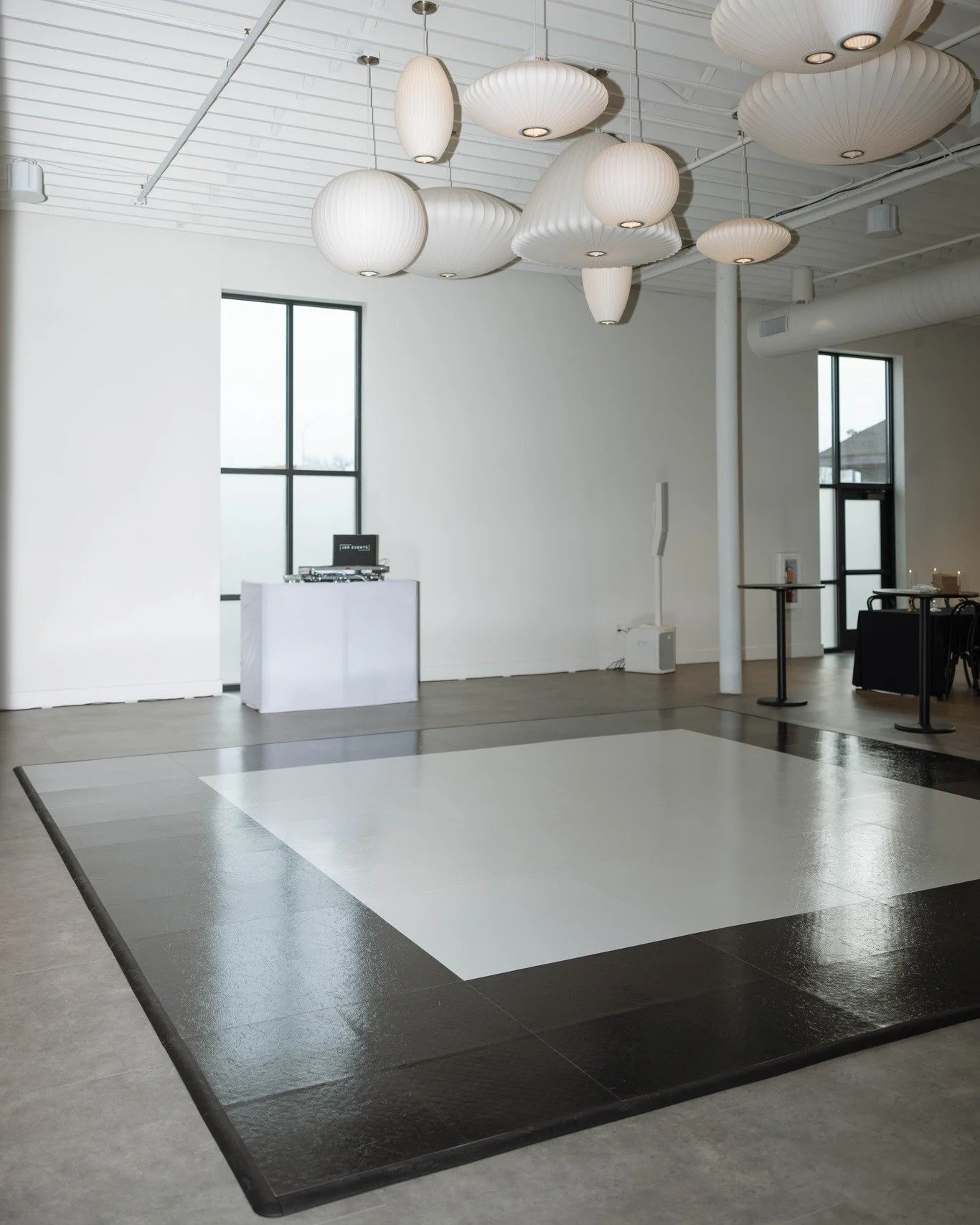 Grounding the room from the ground up.
This custom black-and-white dance floor brings structure, balance, and effortless style to the space.

Photo By: Prairie &amp; Wild
Planner: Serendipitous Events
Venue: Monick Yards