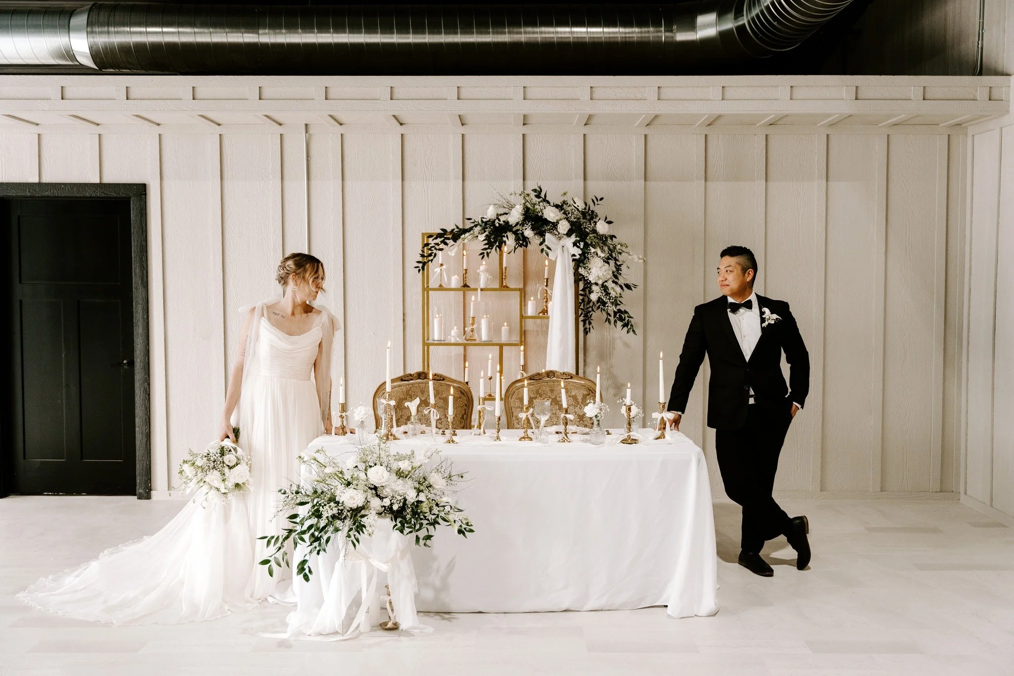 Some tables feel like they were meant for a love story.

Soft whites, heirloom textures, and glowing candlelight create a space that feels both classic and intimate.

Photo by Anna Behning Photography