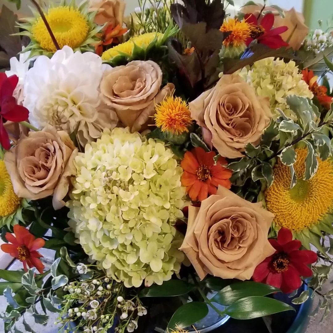 Toffee Roses, Safflowers, Hydrangea, Profusion Zinnias and local Sunflower centers