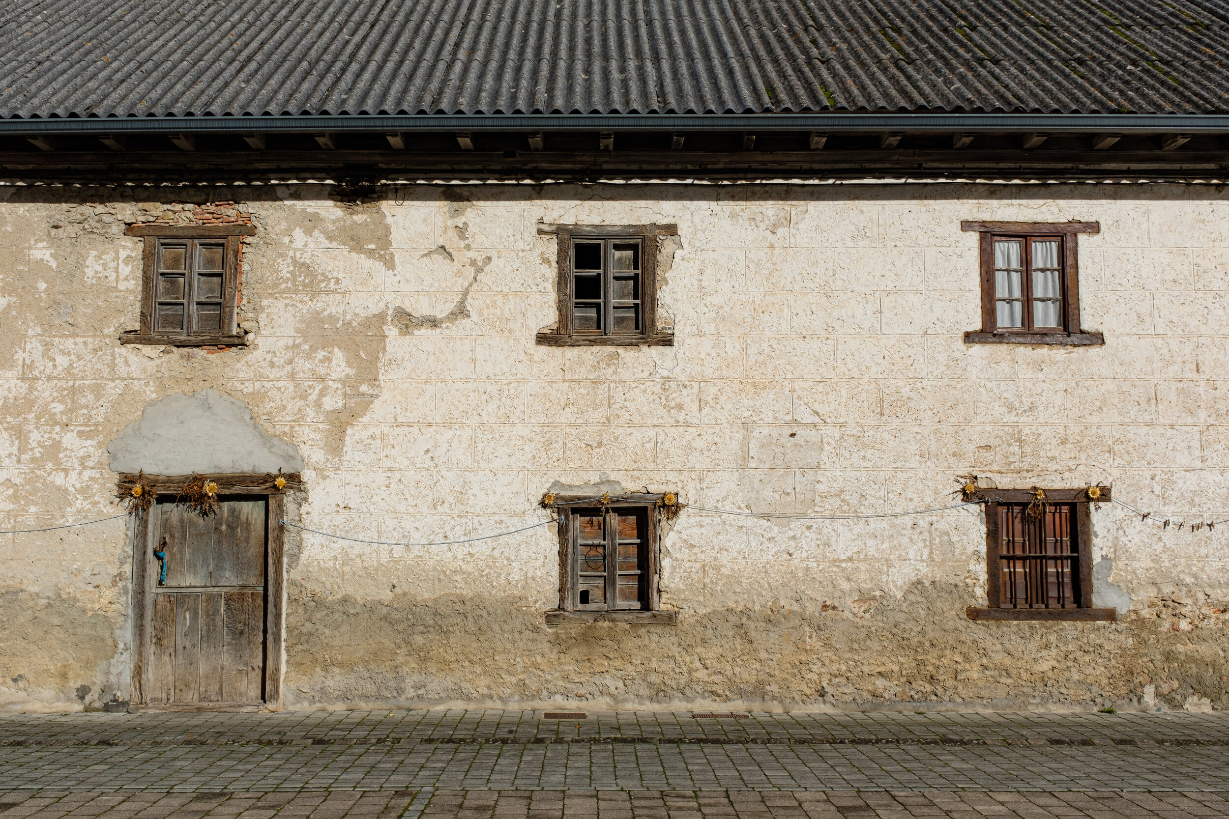 Plaster wall home with wooden windows and door in Navarra, Spain | 2019