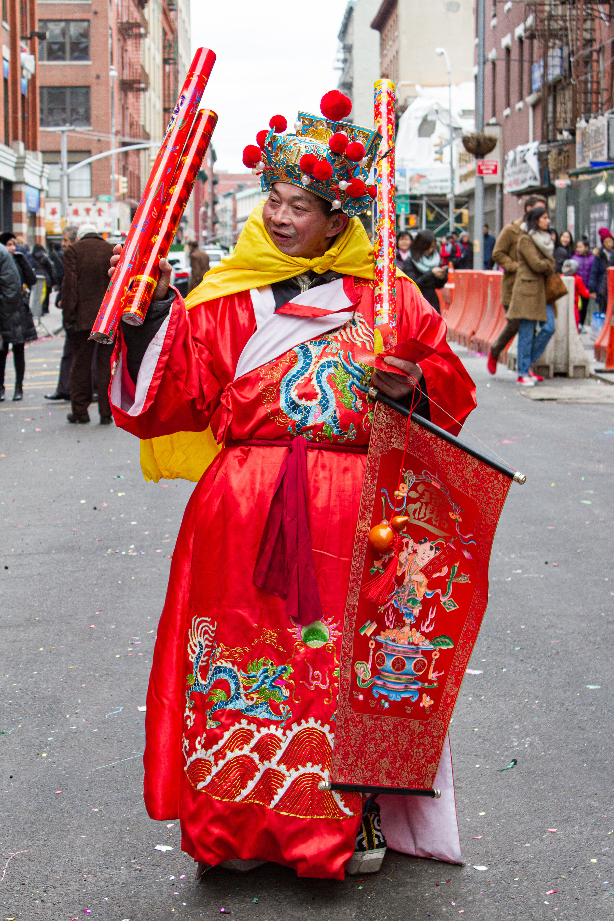 Man dressed in red robe for Chinese New Year celebration in Chinatown, Manhattan | 2017