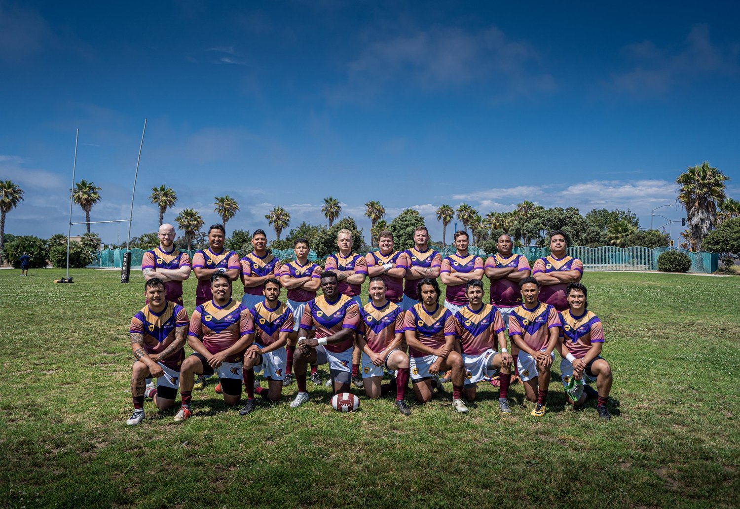 The San Diego Barracudas squad gathered on the field