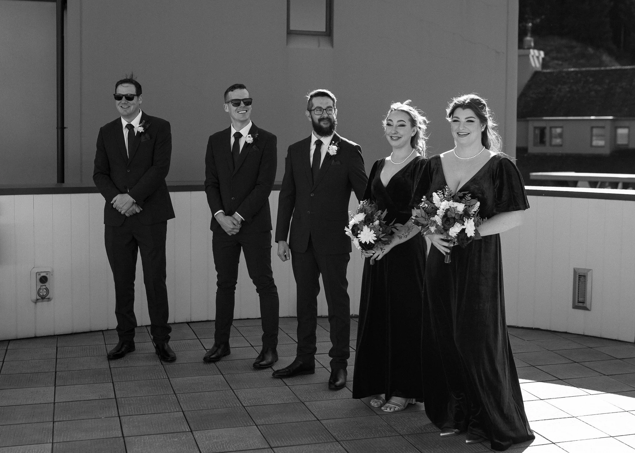    Queenstown winter wedding couple    Snowy wedding portraits Queenstown    Queenstown wedding photographer winter    First look winter wedding Queenstown    Queenstown lakefront bridal party photos    Intimate wedding ceremony Queenstown    Winter 