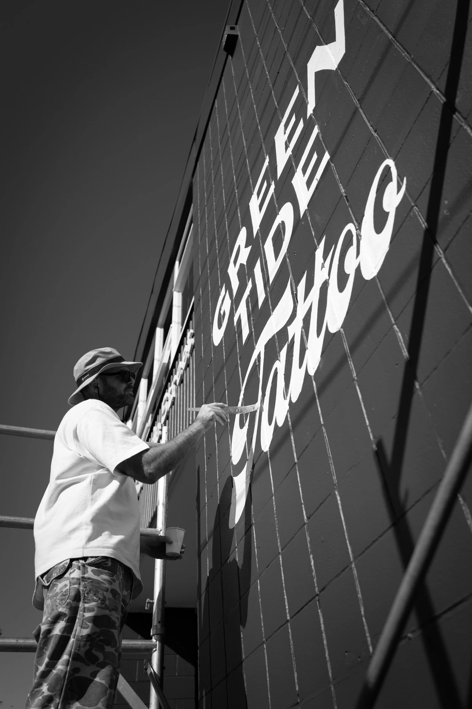 Hand Painted wall sign for Green Tide Tattoo.