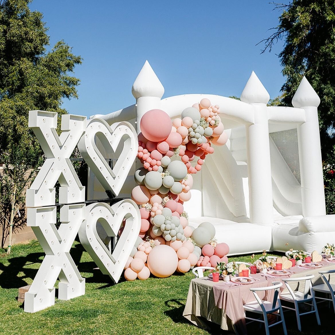 Our most popular rental, the Boujee Combo, all dressed up. 💕

Host &amp; Photographer: @thelaurenstyle
Design &amp; Balloons: @createandinflateeevents
Bounce House: @inflatefortyeight
Marquee Letters: @desertsageaz
Lounge and Table Setting: @letsbas