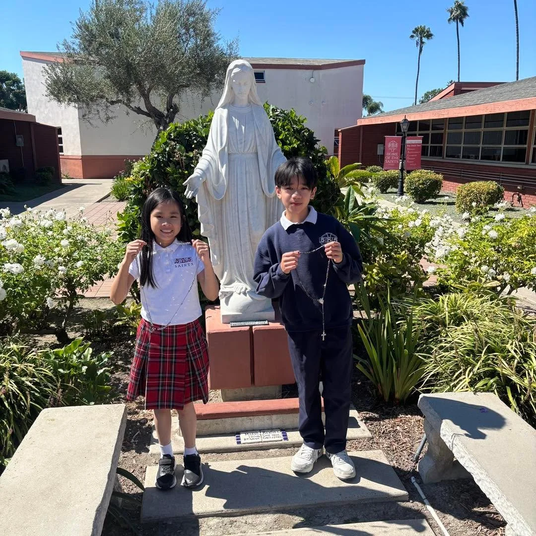 Every October, our 8th graders lead the Living Rosary, a cherished tradition that fills our church with prayer and unity. Forming a circle around the congregation, they represent each bead of the rosary as we pray together. Students also lead the pra