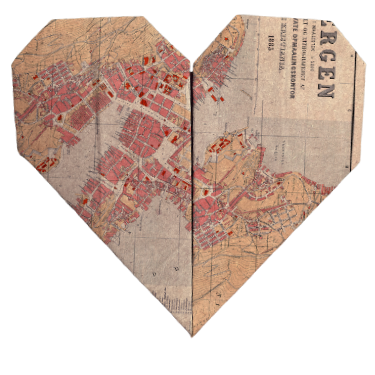 A heart-shaped collage of vintage city maps with streets and buildings highlighted in red.