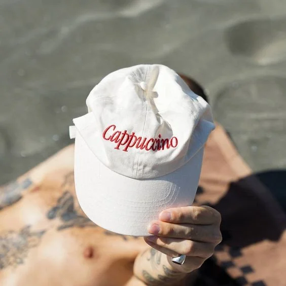 Summer is just around the corner... and the perfect @coffee_supreme_au⁠
CAPPACINO cap is back in stock. ⁠
⁠
The low profile dad cap we produced features front CAPPACINO embroidery, and coffee supreme back embroidery. Finished with an antique brass sl