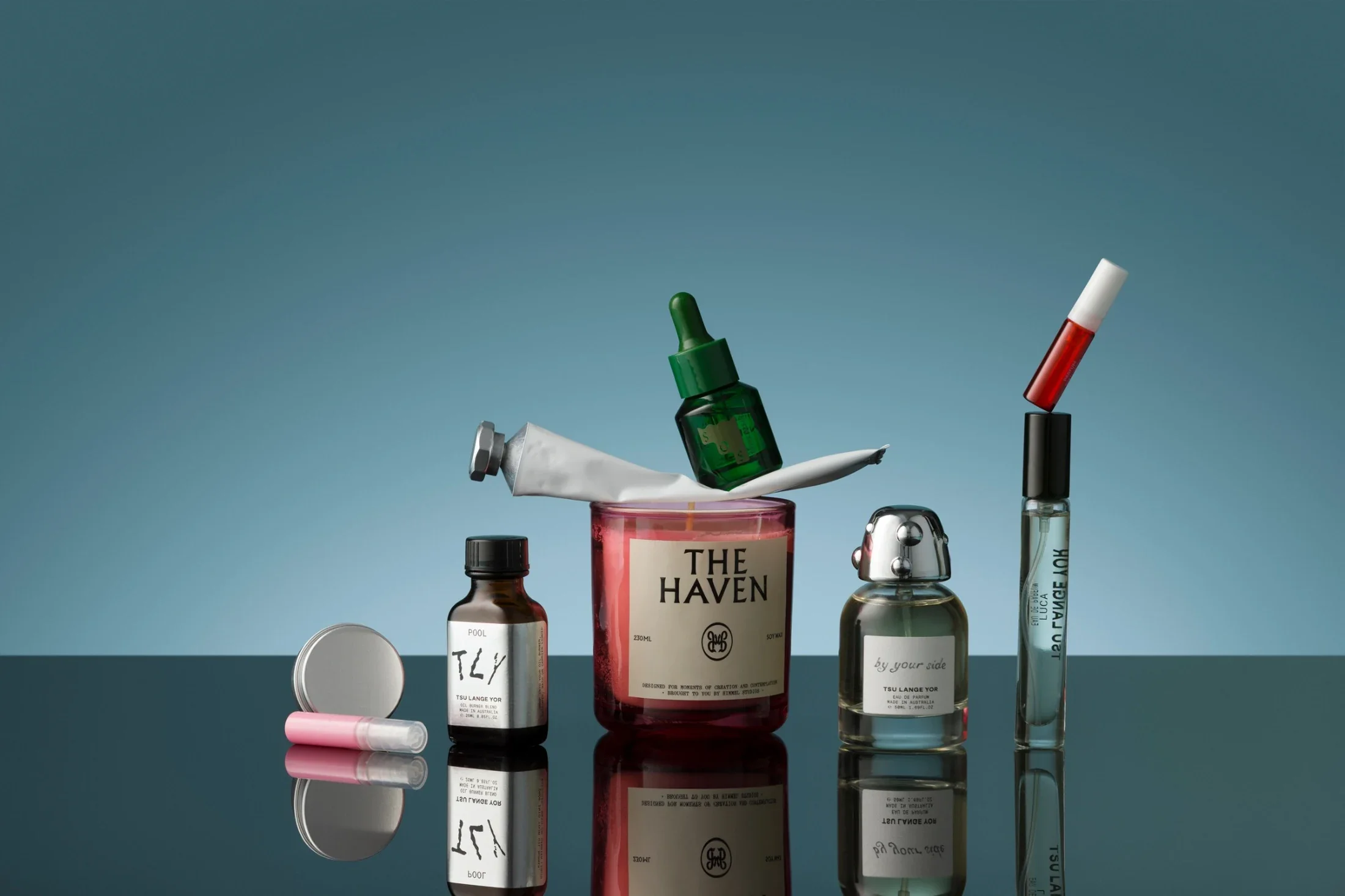 Contain Perfume vessel sourcing bottles stacked still life image candles 