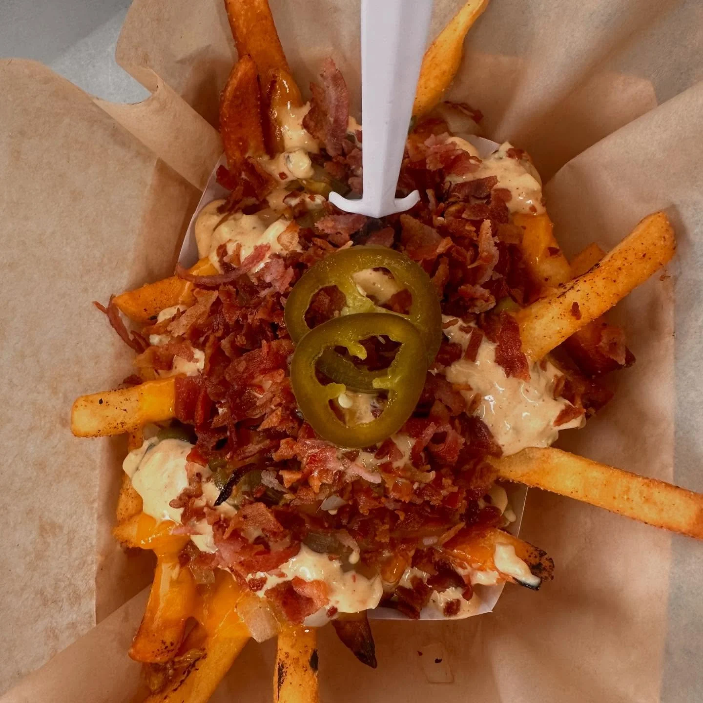 F I L T H Y // animal fries are everyone&rsquo;s favorite off-menu item. We might put em on the menu for real eventually but until then you have to be brave enough to ask for em. We&rsquo;re in front of @wild.idy all weekend.