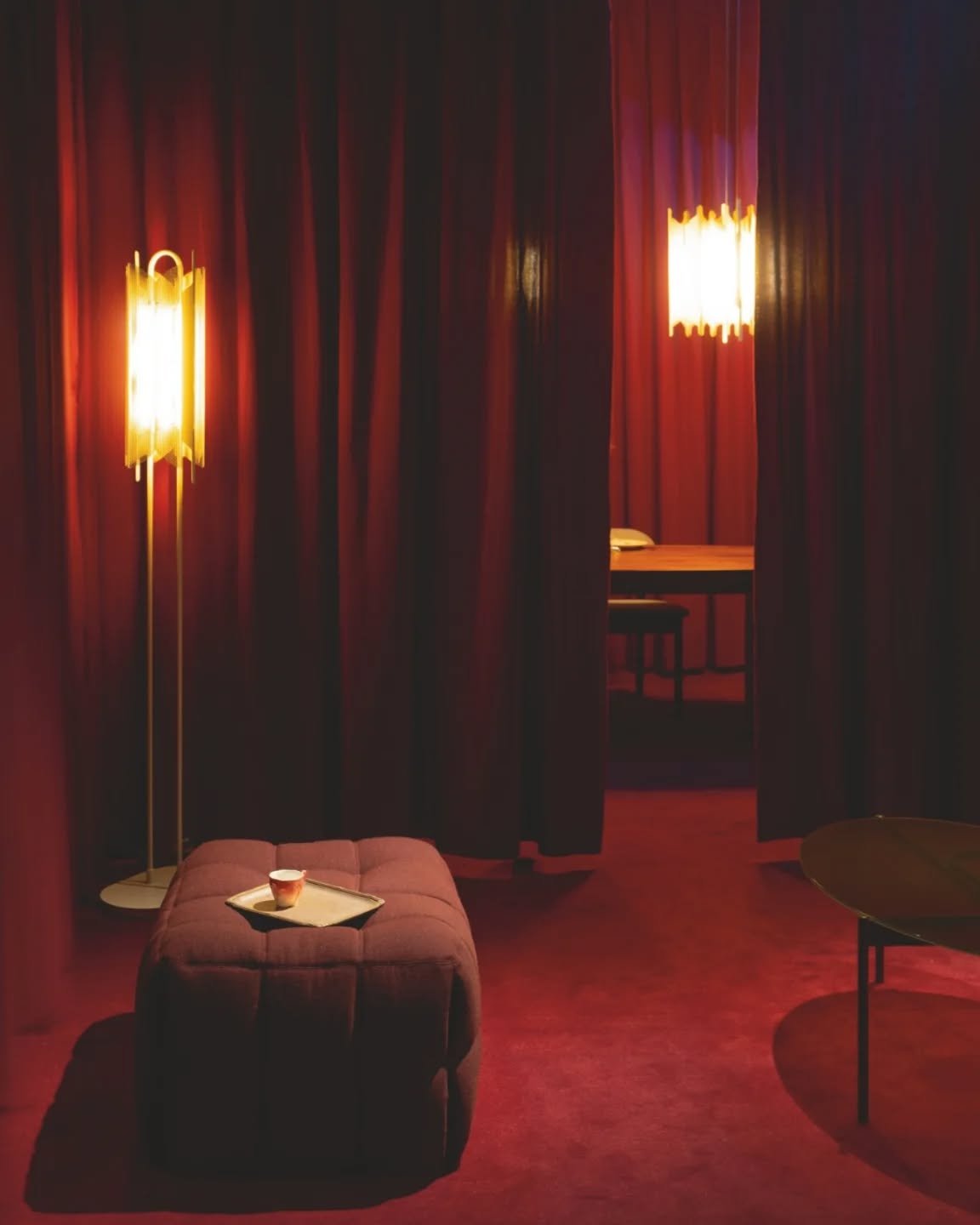 Light as atmosphere, not accessory.
Benjamin Graindorge&rsquo;s Nef illuminated more than the room&mdash;it shaped how it felt. Bathed in rich gold and crimson tones, the piece played with shadow like a sculptor with clay.

In frame: the Nef lamp

#L
