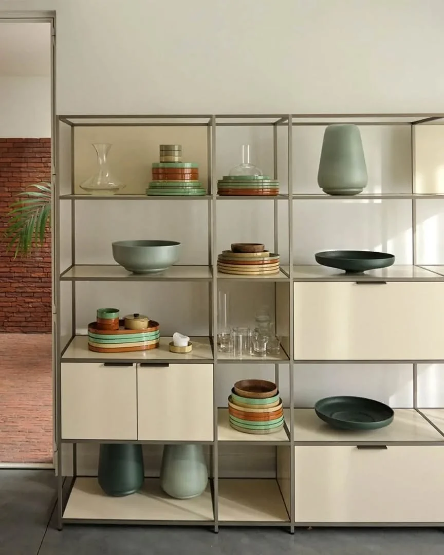 Between storage and sculpture, function becomes form.

Within the Dita system by @pagnon.pelhaitre.design, the Bolet Vase by @benjamingraindorge_studio emerges as more than an object, it becomes a presence.

Its organic volumes and soft celadon glaze