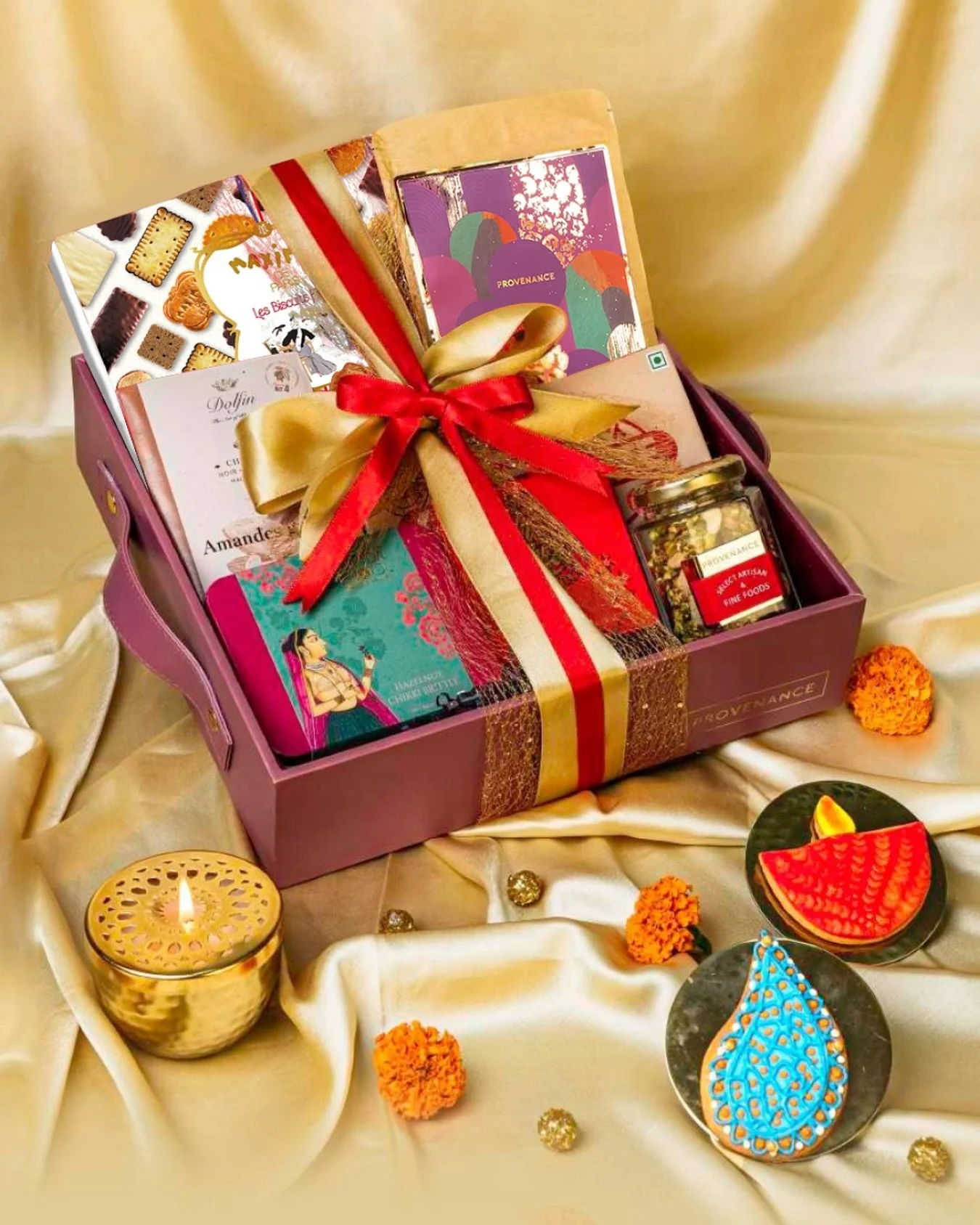 This Diwali, gift a statement of style and indulgence with the Provenance Exclusive Tray. 
Curated with the finest from around the world - The rich indulgence of Dolfin and ROYCE’ chocolates, the Parisian charm of Maxim’s biscuits and l