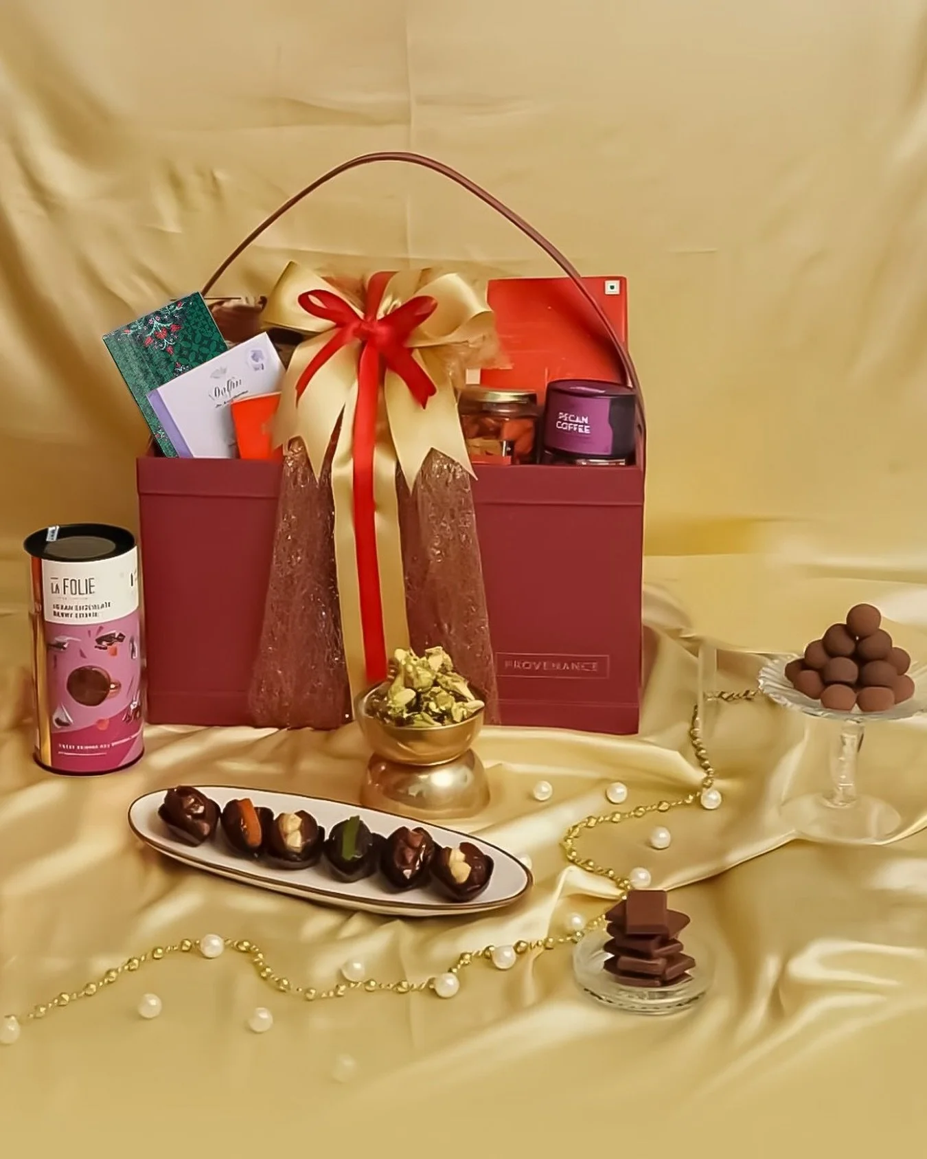 As homes glow with diyas and festive aromas fill the air, the Festival of Lights Gift Box brings the spirit of Diwali to life.
Overflowing with gourmet delights like Kunafa chocolate, Maxim’s premium treats, and Torres truffle chips, it celebra