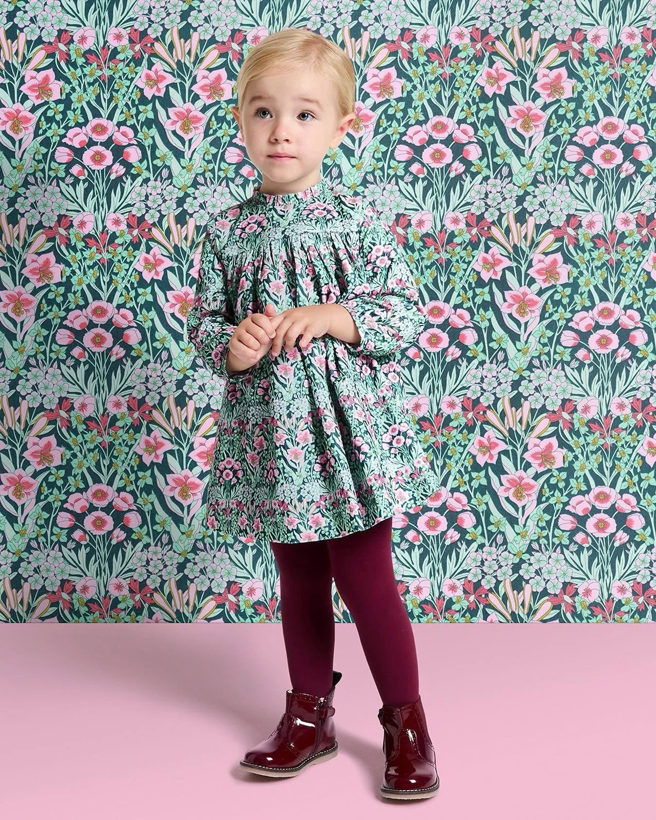 This season, let your little one wander into a garden of
dreams with our enchanting velvet dress. Draped in soft milleraies velvet and kissed by the delicate blooms of exclusive Liberty Mountain Primerose fabric, every
gathered detail and gentle slee