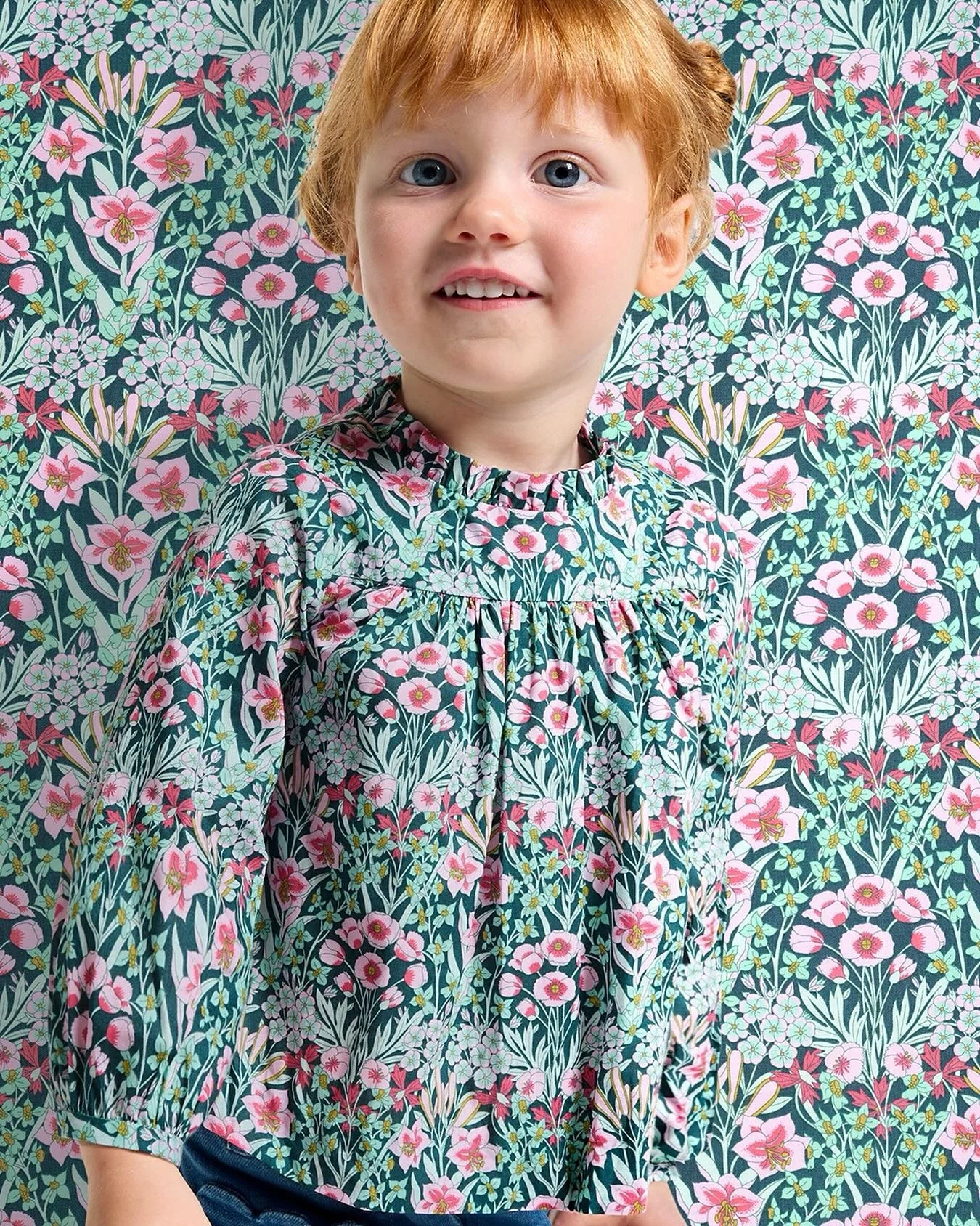 Where classic romance meets everyday wear. This all-new Jacadi Liberty cotton blouse, adorned with delicate ruffles and a gathered collar, effortlessly elevates any seasonal occasion with its graceful charm and comfortable fit - perfectly paired wit