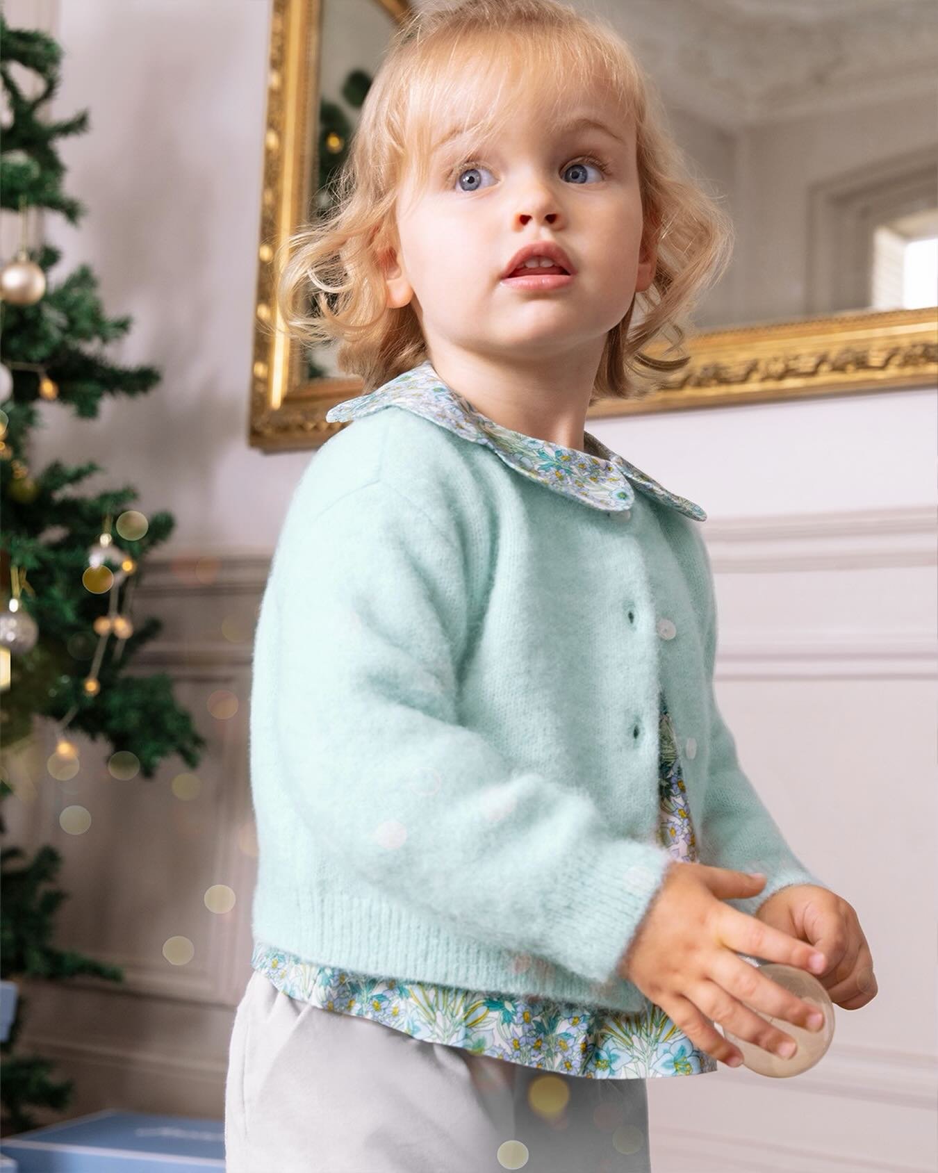 A Liberty print blouse peeks out from beneath a soft pastel cardigan &mdash; a pairing that captures the tenderness of the season. Gentle hues, delicate florals, and cozy textures come together to reflect the quiet beauty of winter moments. ❄️🌸​

Av