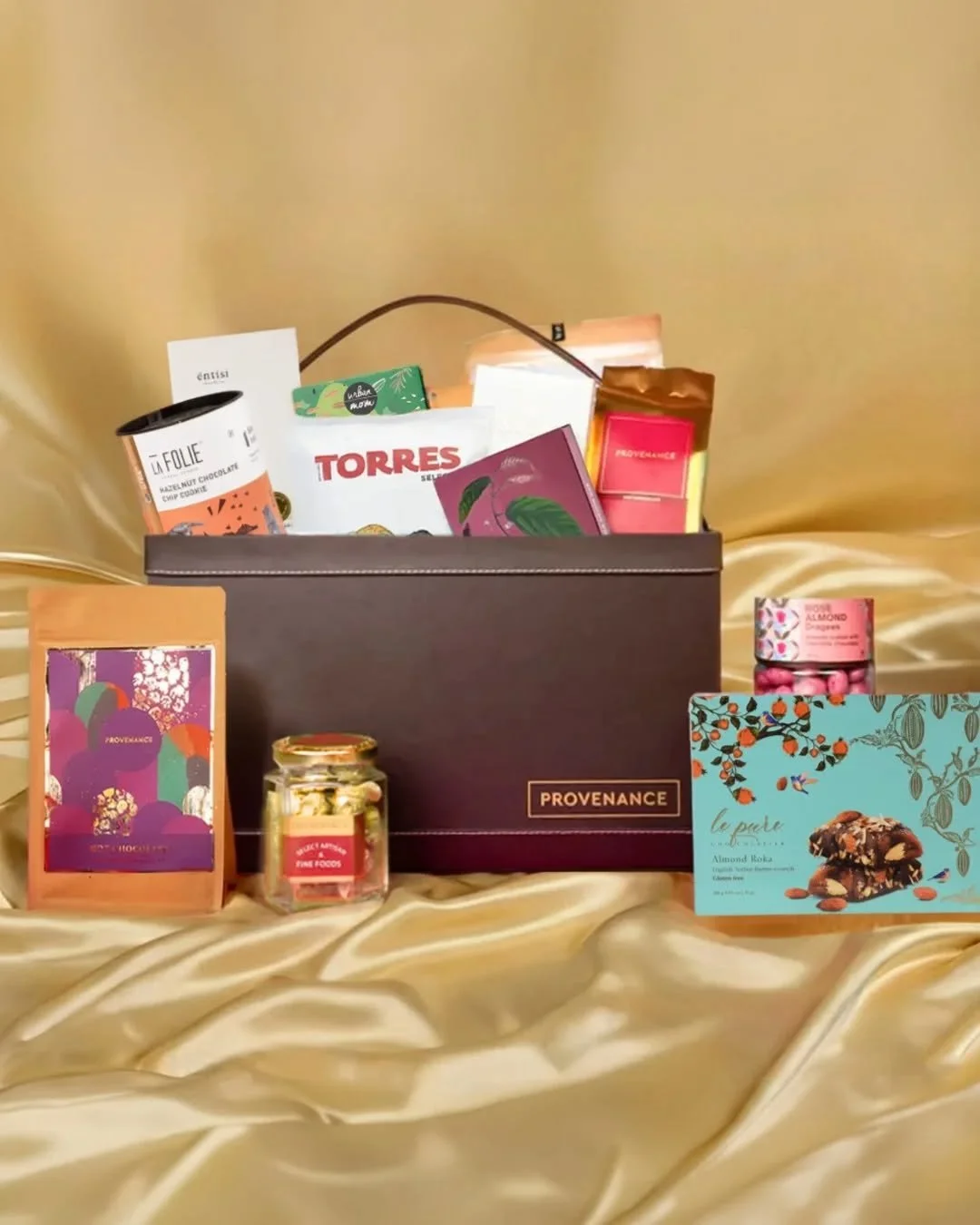Make dessert unforgettable. 🍫
The After Dinner Hamper combines artisanal chocolates, truffle chips, gourmet nuts, and Provenance hot chocolate in a beautifully crafted leather tray. Perfect for sharing&mdash;or keeping all to yourself.

Available in