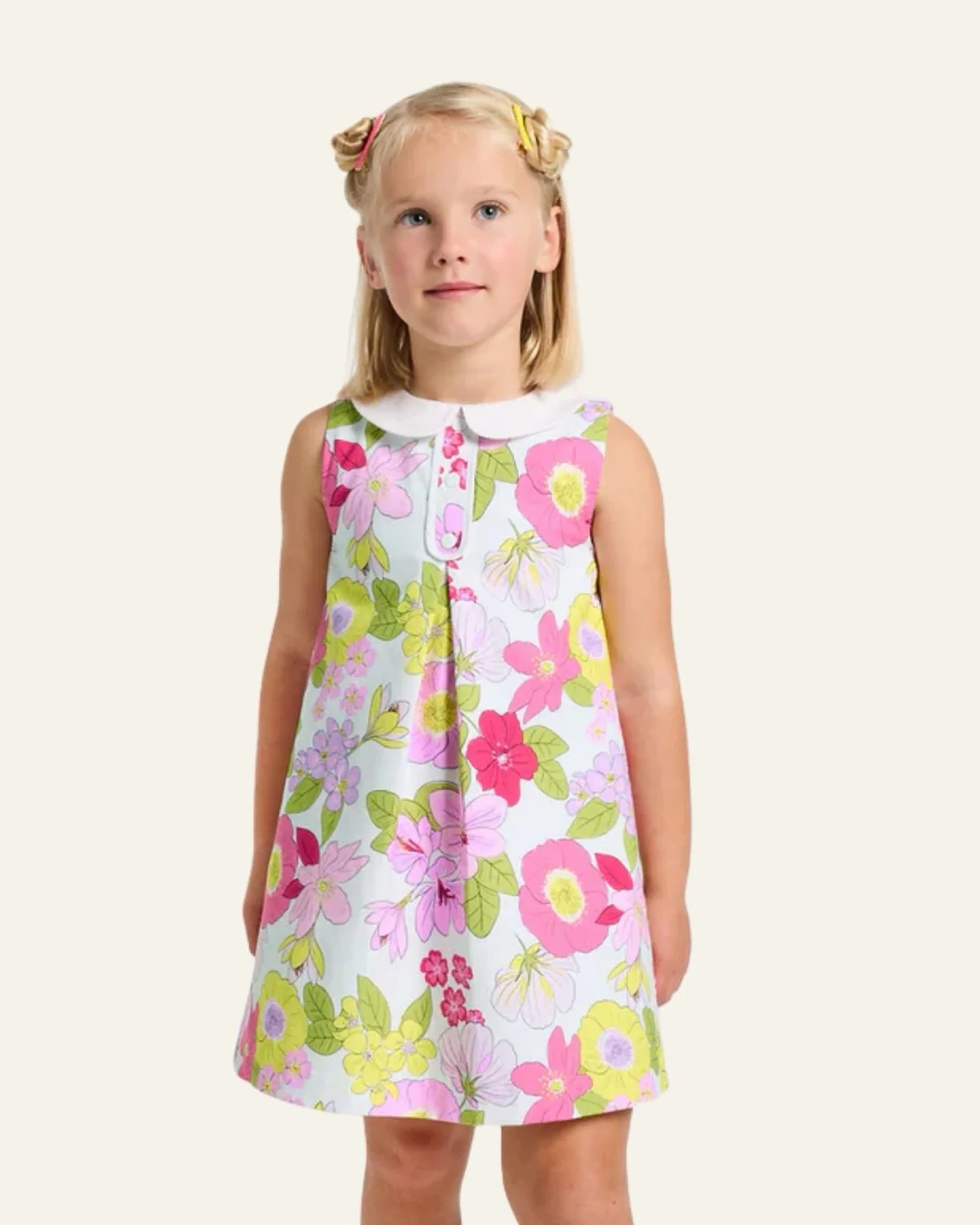 A touch of retro charm 🌼​
​
With its floral print, structured pleats, and a beautifully draped trapeze cut, this dress blends timeless design with thoughtful craftsmanship.​

Perfect for every summer occasion.​

Available in stores and online.