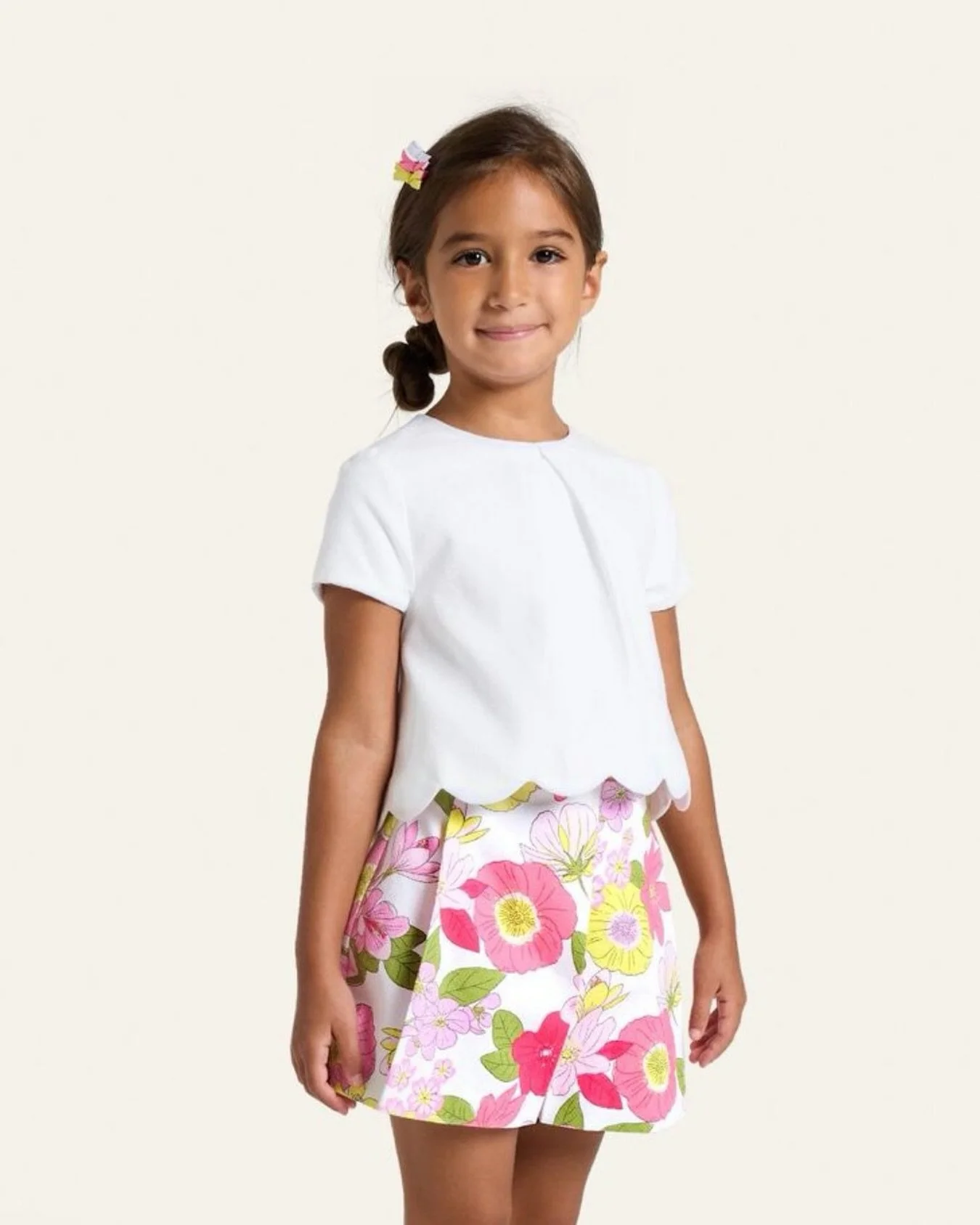 A statement in bloom 🌸​

Bold florals meet a beautifully structured silhouette, creating a look that feels both playful and refined.​

Perfect for little celebrations and special outings.​

Available in stores and online.​