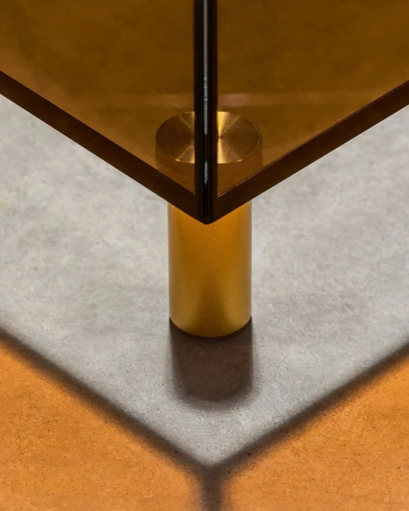 Albers coffee tables by @marieaurorestikermetral 

​With a smoked glass top and base, amber glass sides and brass legs, this table offers the perfect combination of style and functionality to complete any living space. ​

​Smoked-tinted tempered glas