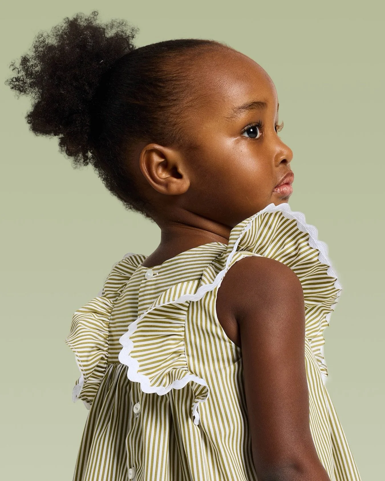 Light, breezy, perfect!​

Crafted in soft organic cotton, this top features ruffled sleeves and a delicate white croquet trim for a sweet, romantic look. Tone-on-tone buttons make dressing effortless, letting her twirl through sunny days in style.​

