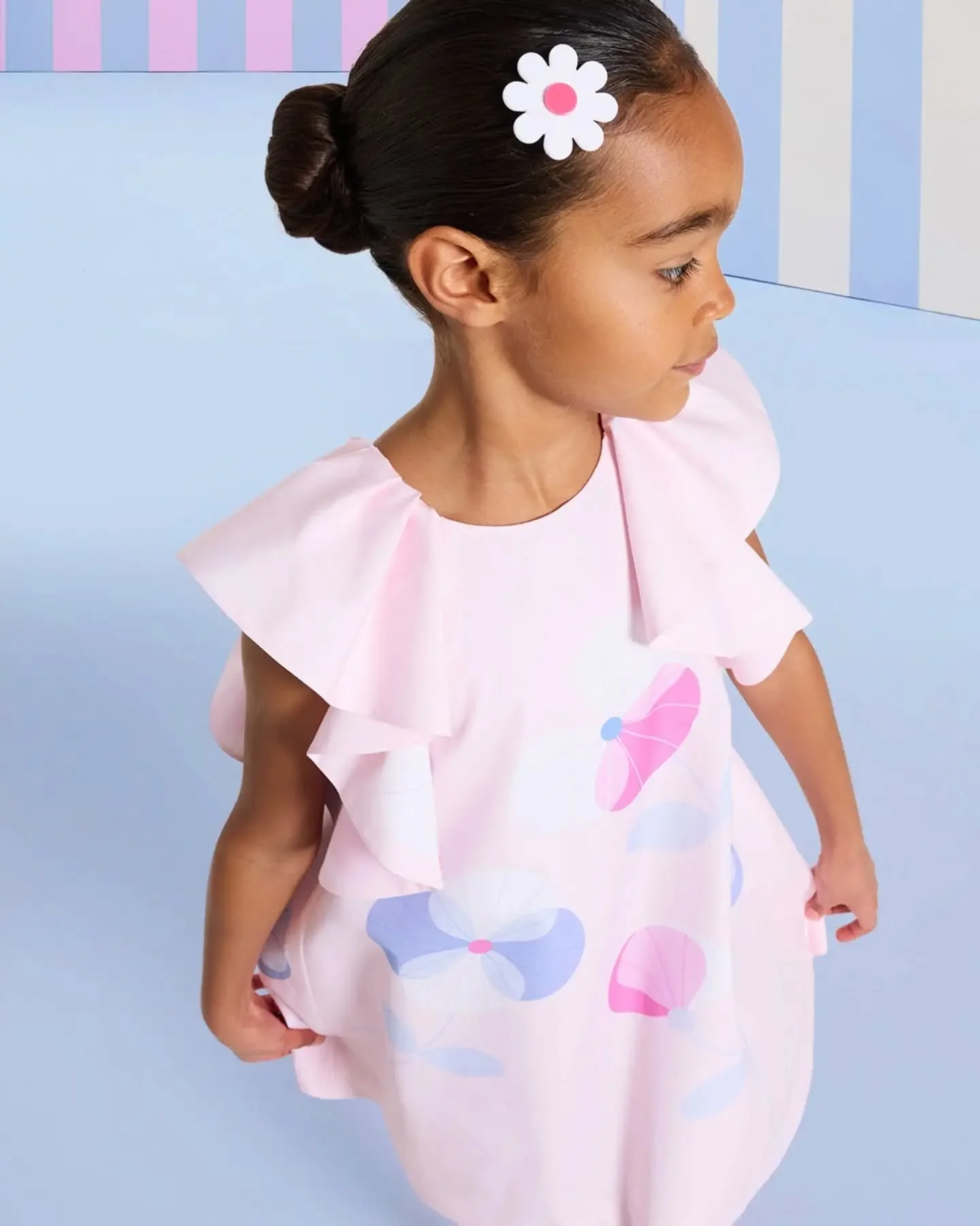 Modern elegance blooms in this airy summer silhouette.

Designed with an A-line cut and graceful butterfly sleeves, this summer dress moves effortlessly from vacation days to special moments.

Available in store and online.