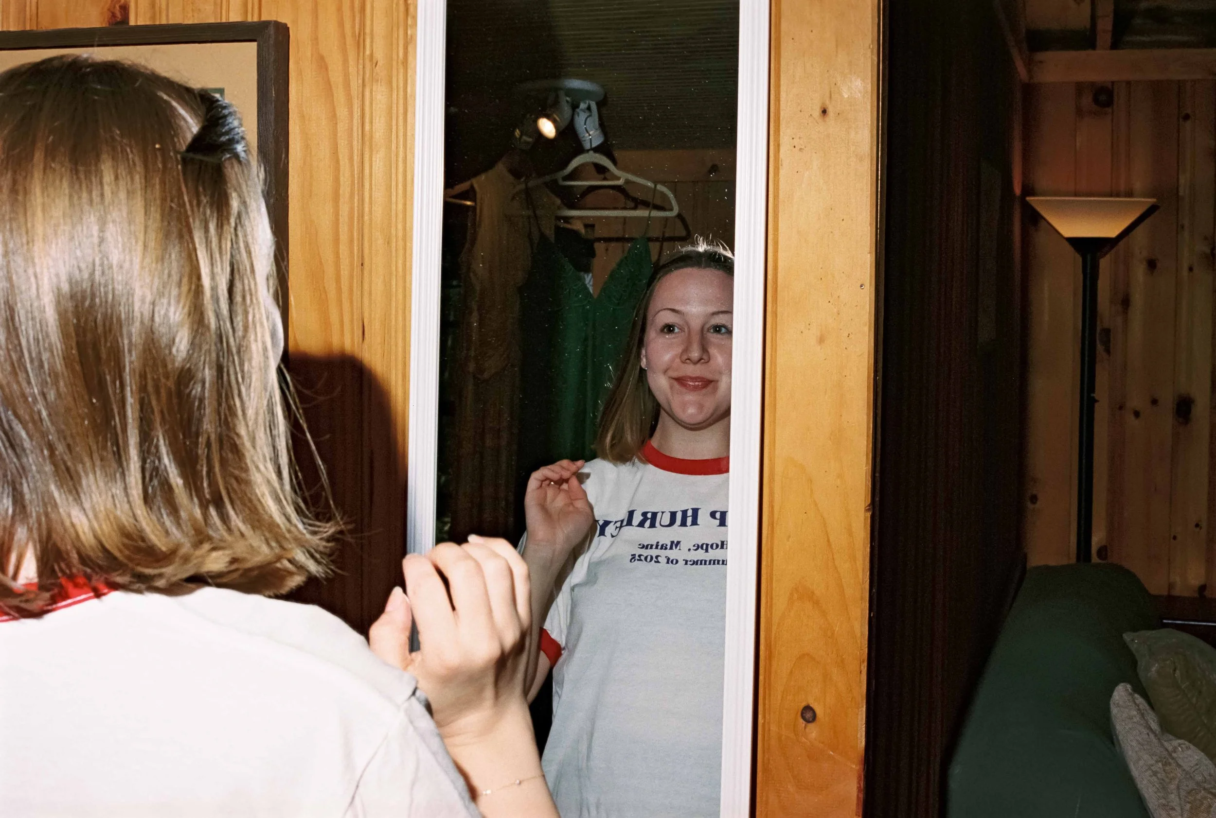 Girls getting ready at a camp for a wedding in Maine