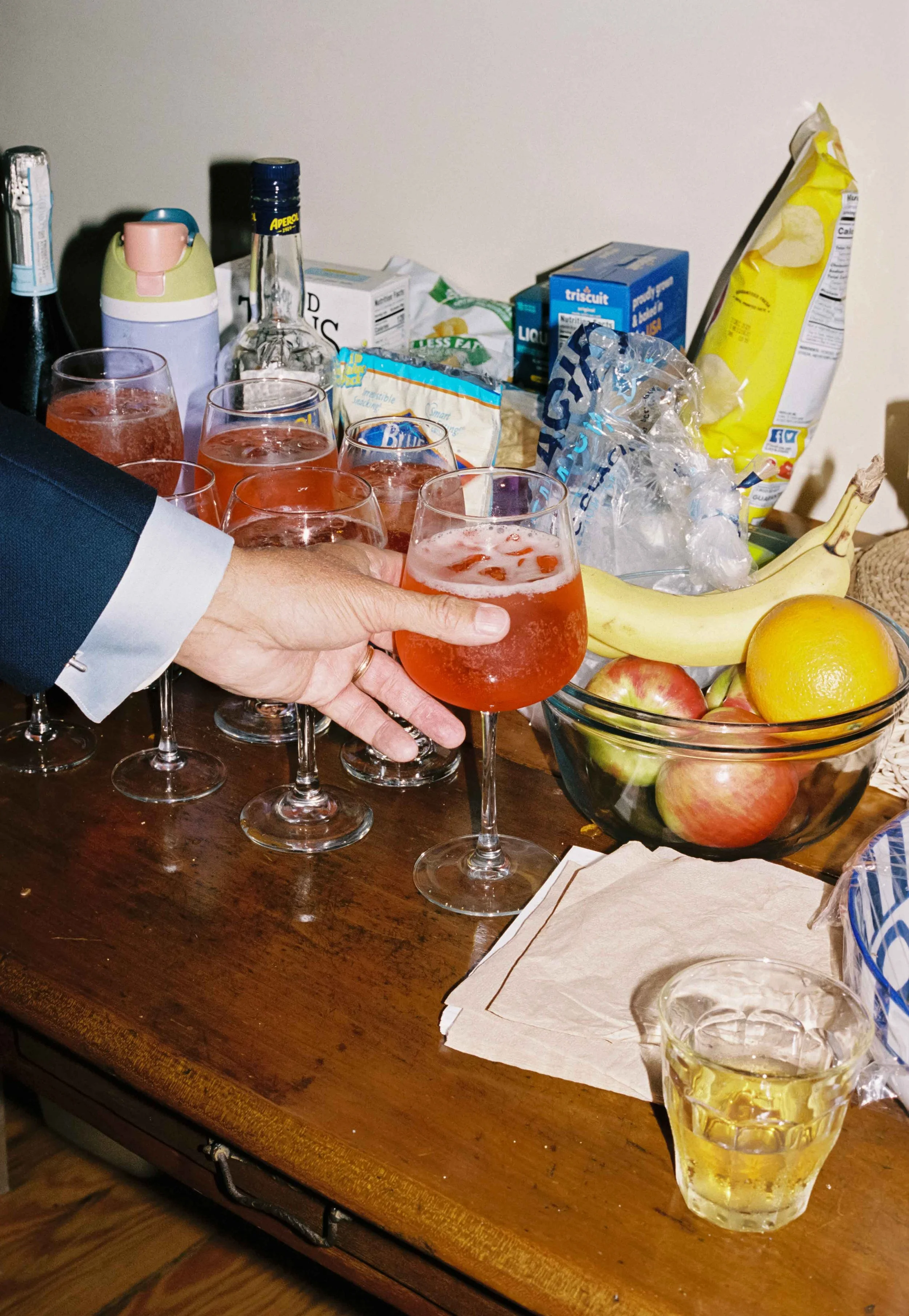 Wedding guest grabbing a drink