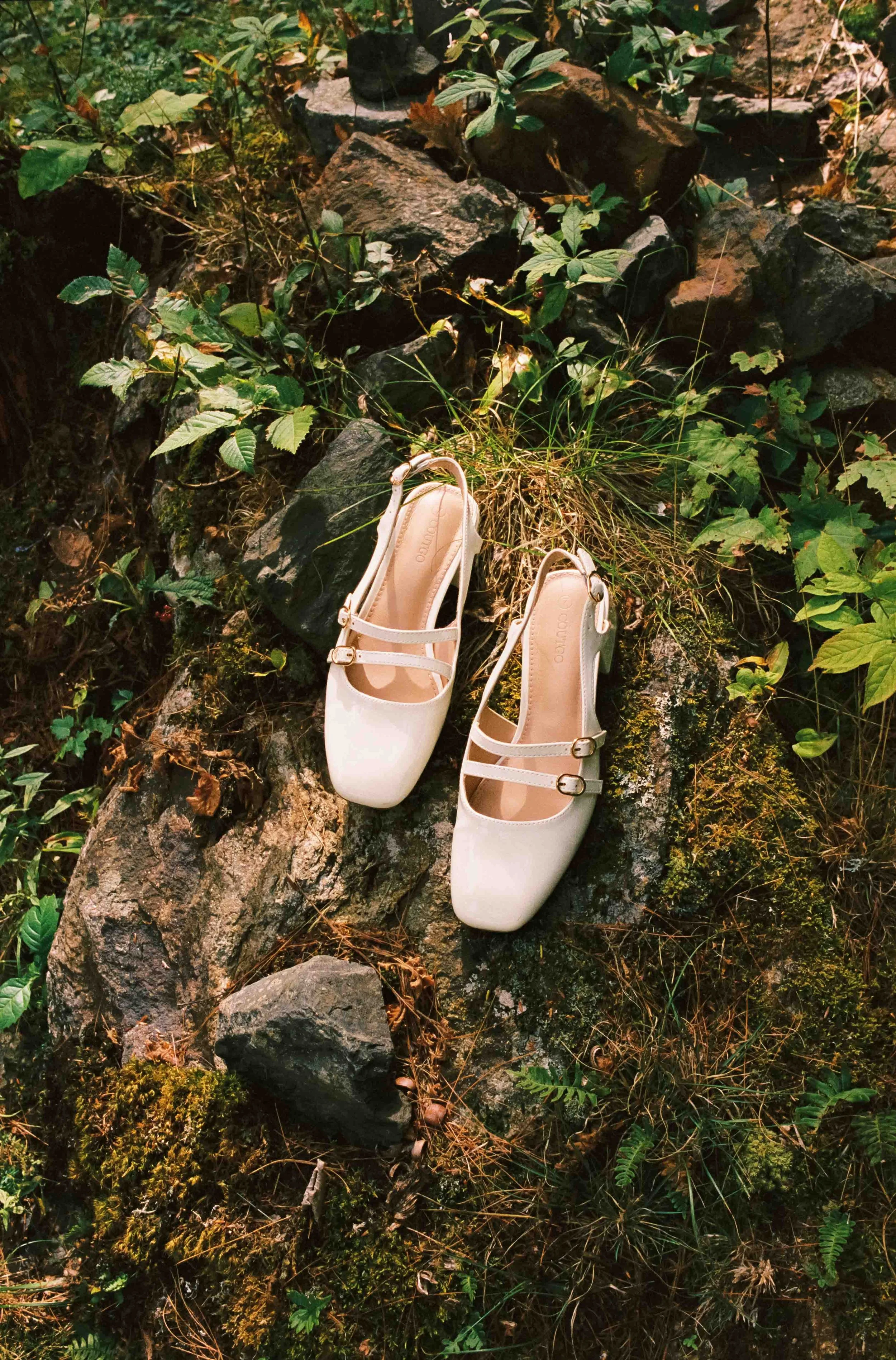 Bridal shoes on a rock