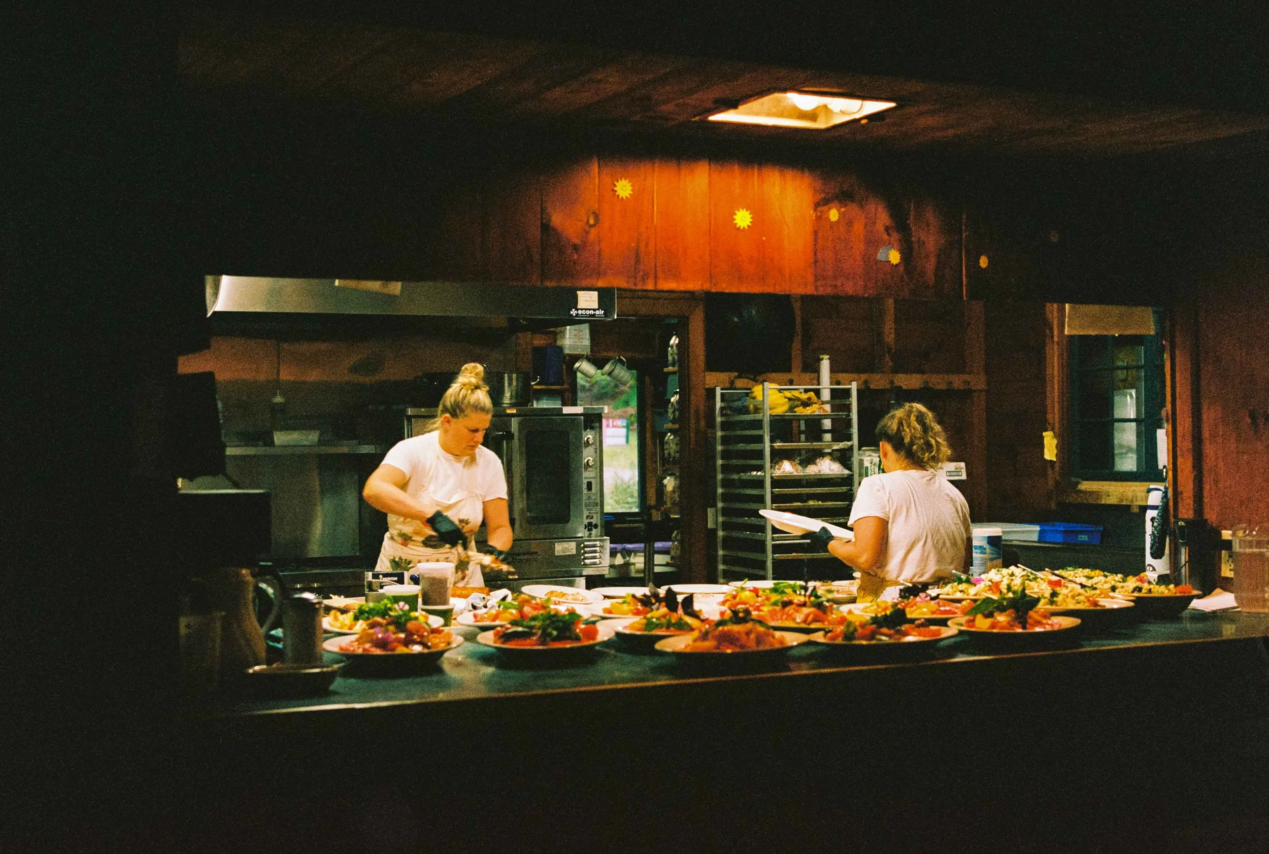 Kitchen cooks cooking a wedding meal