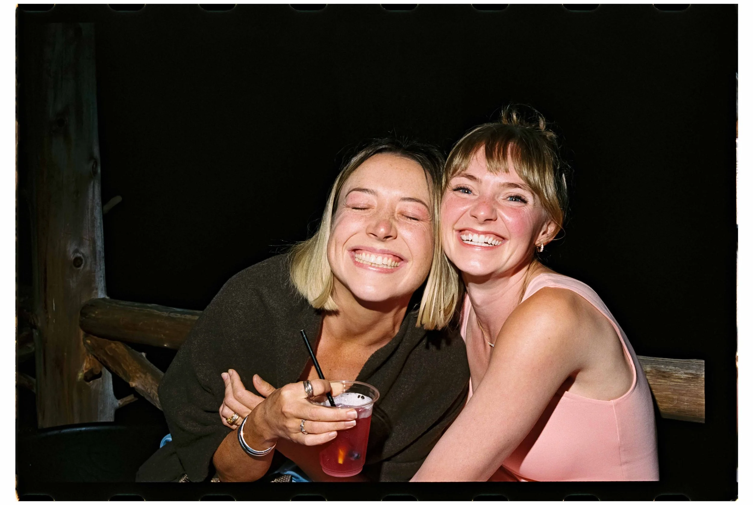 Candid dance floor moment captured on film at a Maine Camp wedding