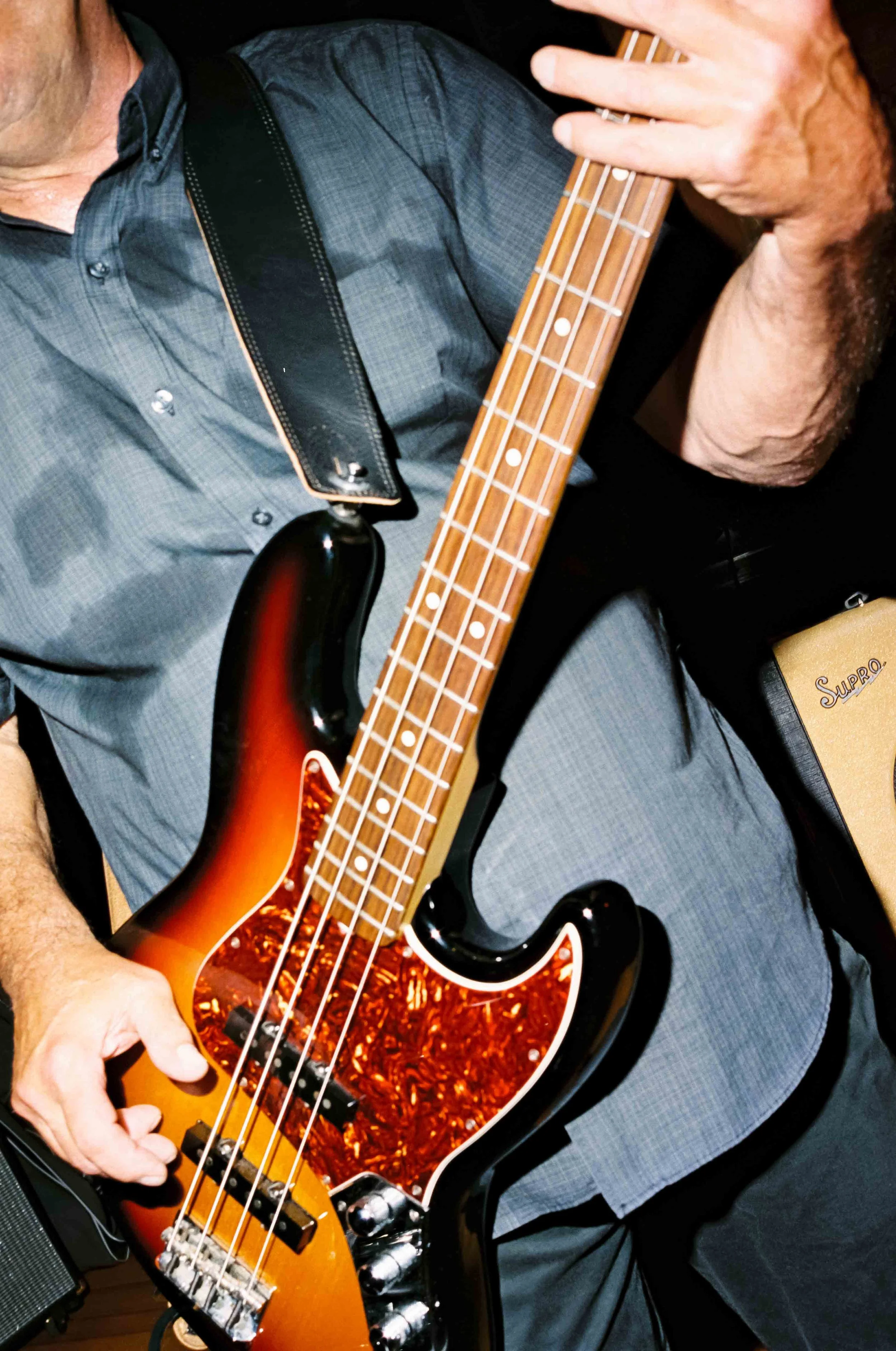 Man playing a guitar at a wedding