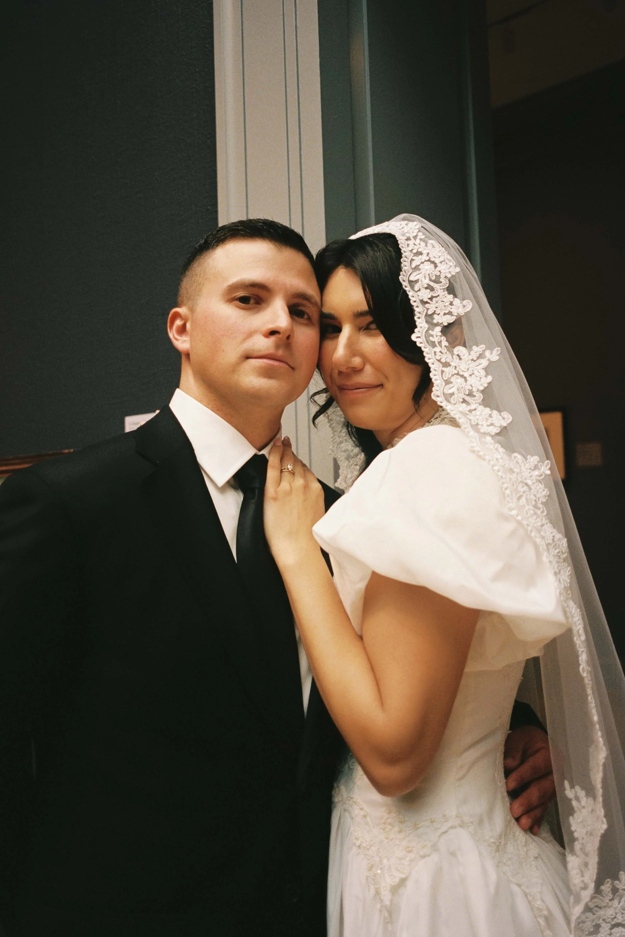 Artful film photo of a wedding couple at the Chicago Art Institute