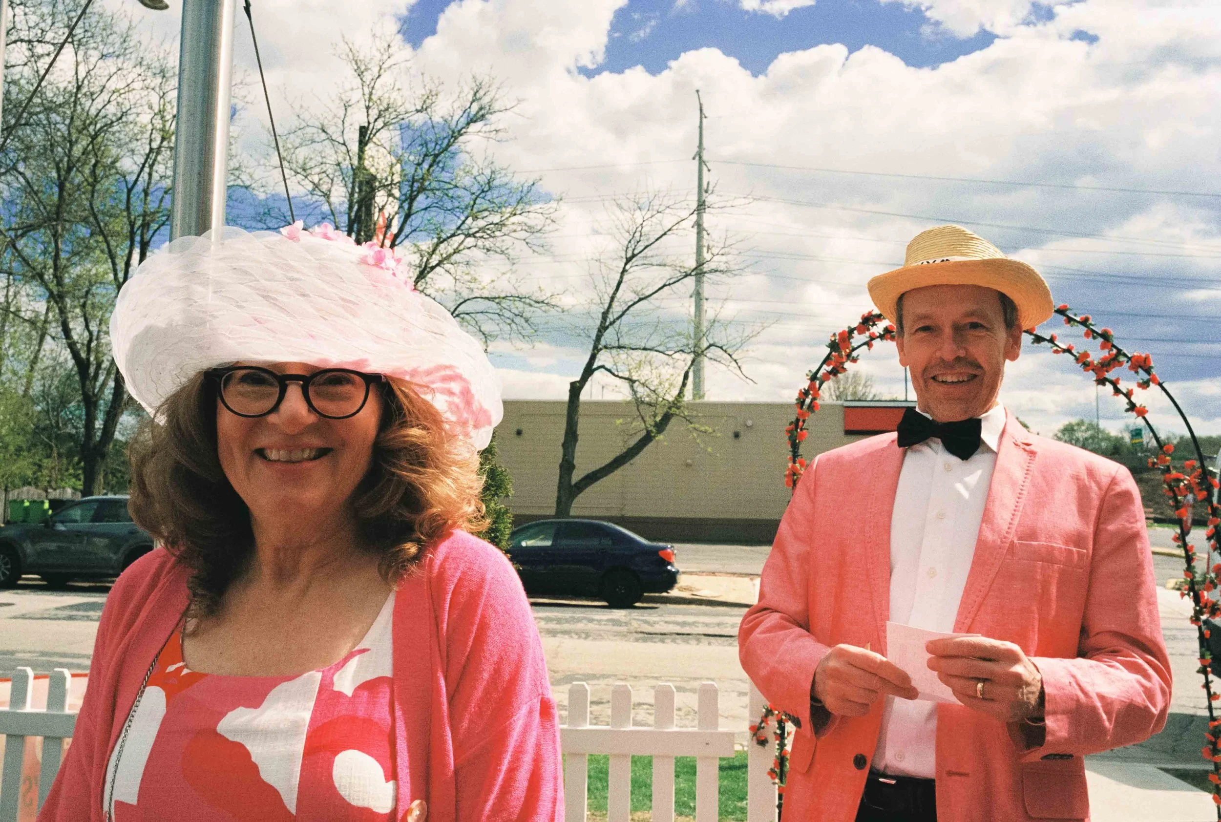 Kentucky Derby couple smiling at the camera