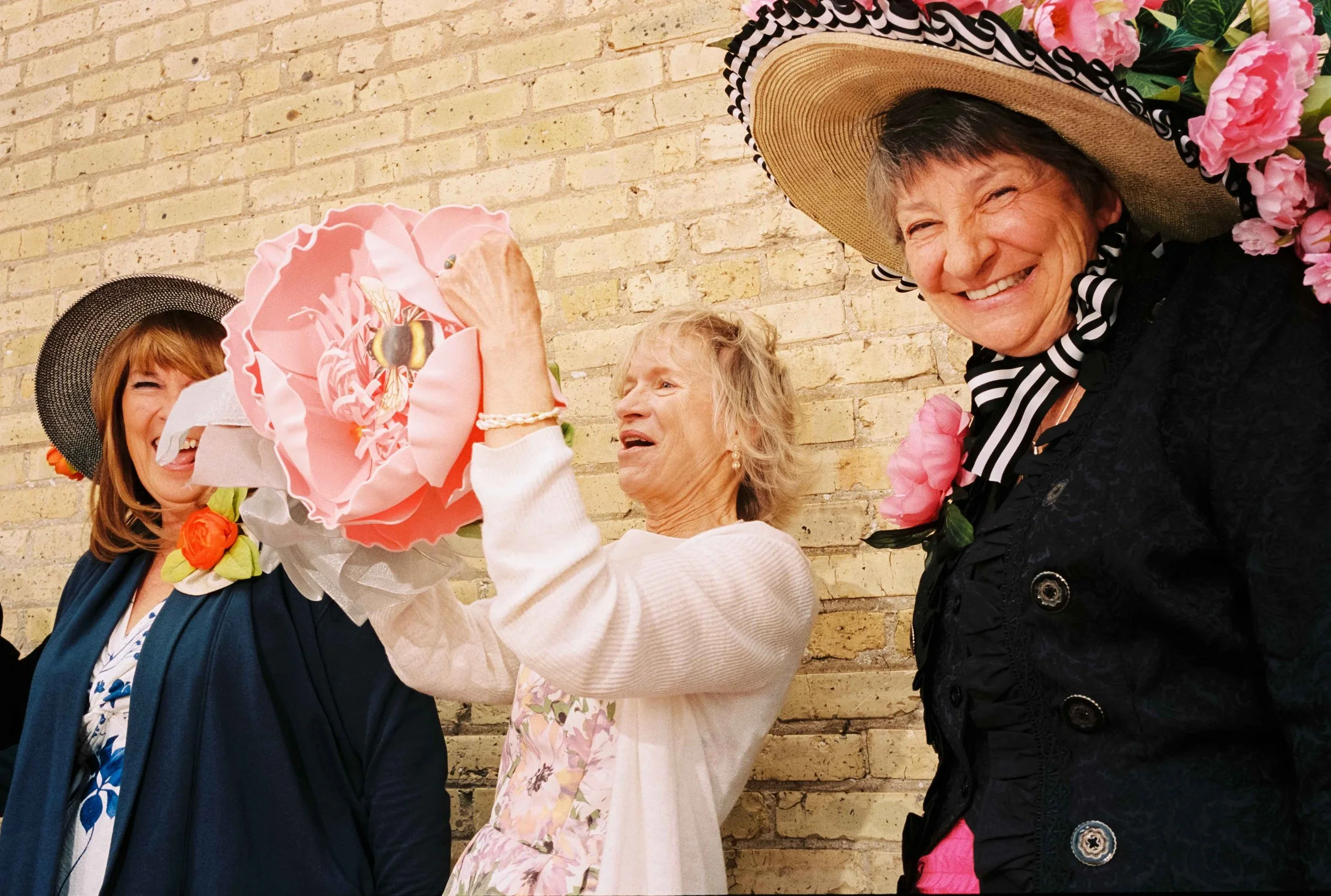 Women smiling at my camera on the Kentucky Derby Day