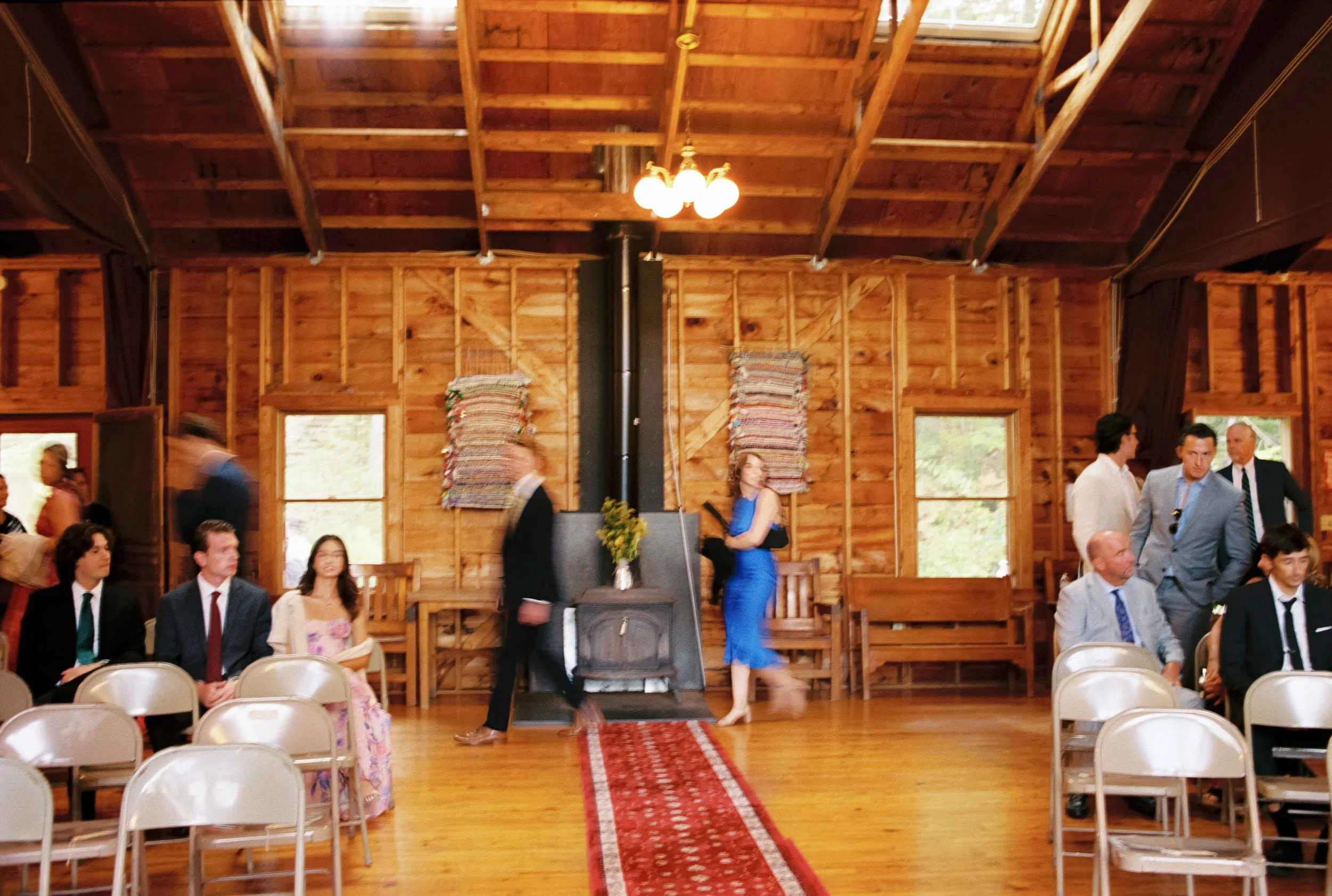 Ceremony candid of guests walking by