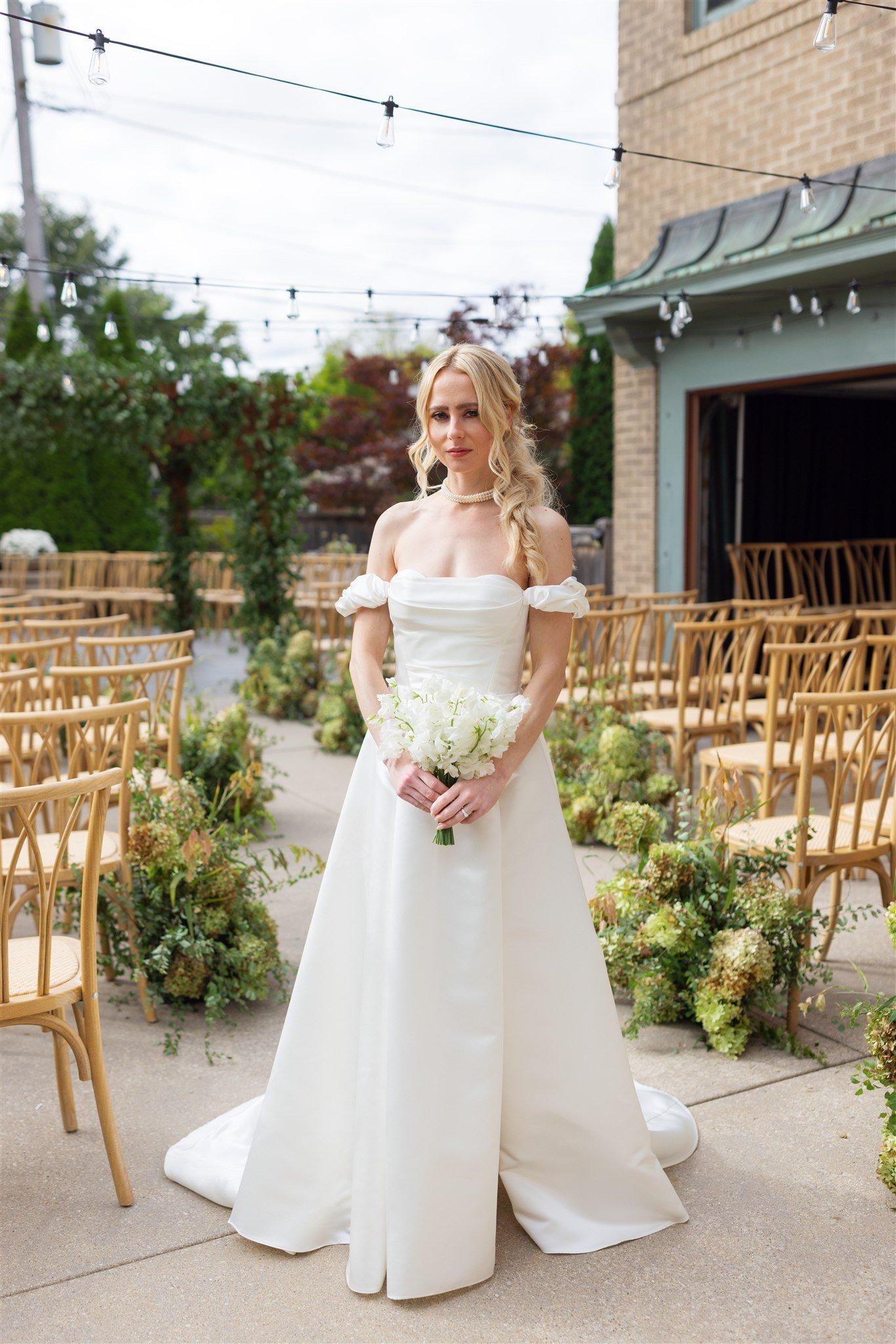 An editorial bridal portrait in her ceremony space