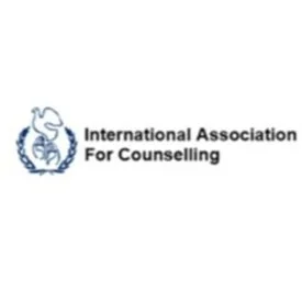 Logo of the International Association for Counselling, featuring a stylized owl and the organization's name.
