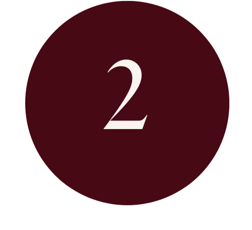 Number 2 displayed in white on a dark red circular background.