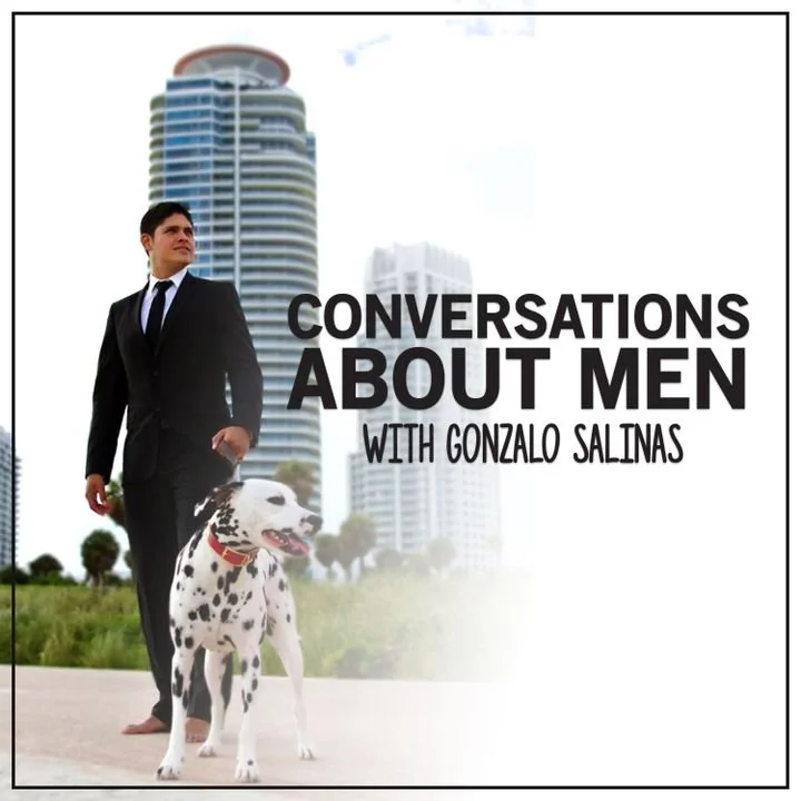 A man in a suit walking a Dalmatian dog outdoors with modern high-rise buildings in the background, and text overlaid that says 'Conversations About Men with Gonzalo Salinas'.