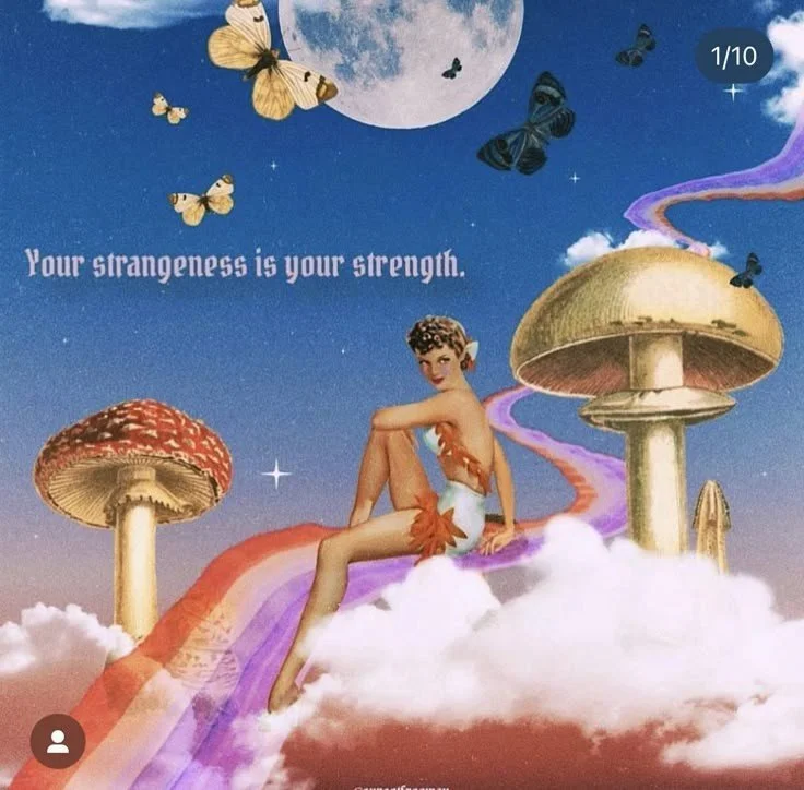 A woman with short curly hair sitting on a rainbow road among clouds, mushrooms, and flying butterflies, with a large full moon in the night sky. The text says, "Your strangeness is your strength."