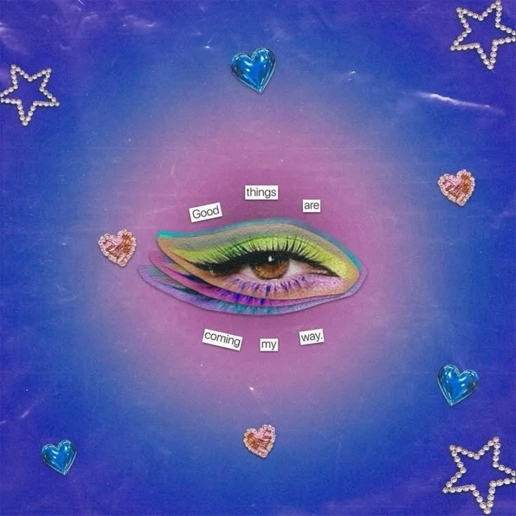A collage featuring an eye with colorful makeup, surrounded by heart and star-shaped decorations on a purple background. Text reads, 'Good things are coming my way.'