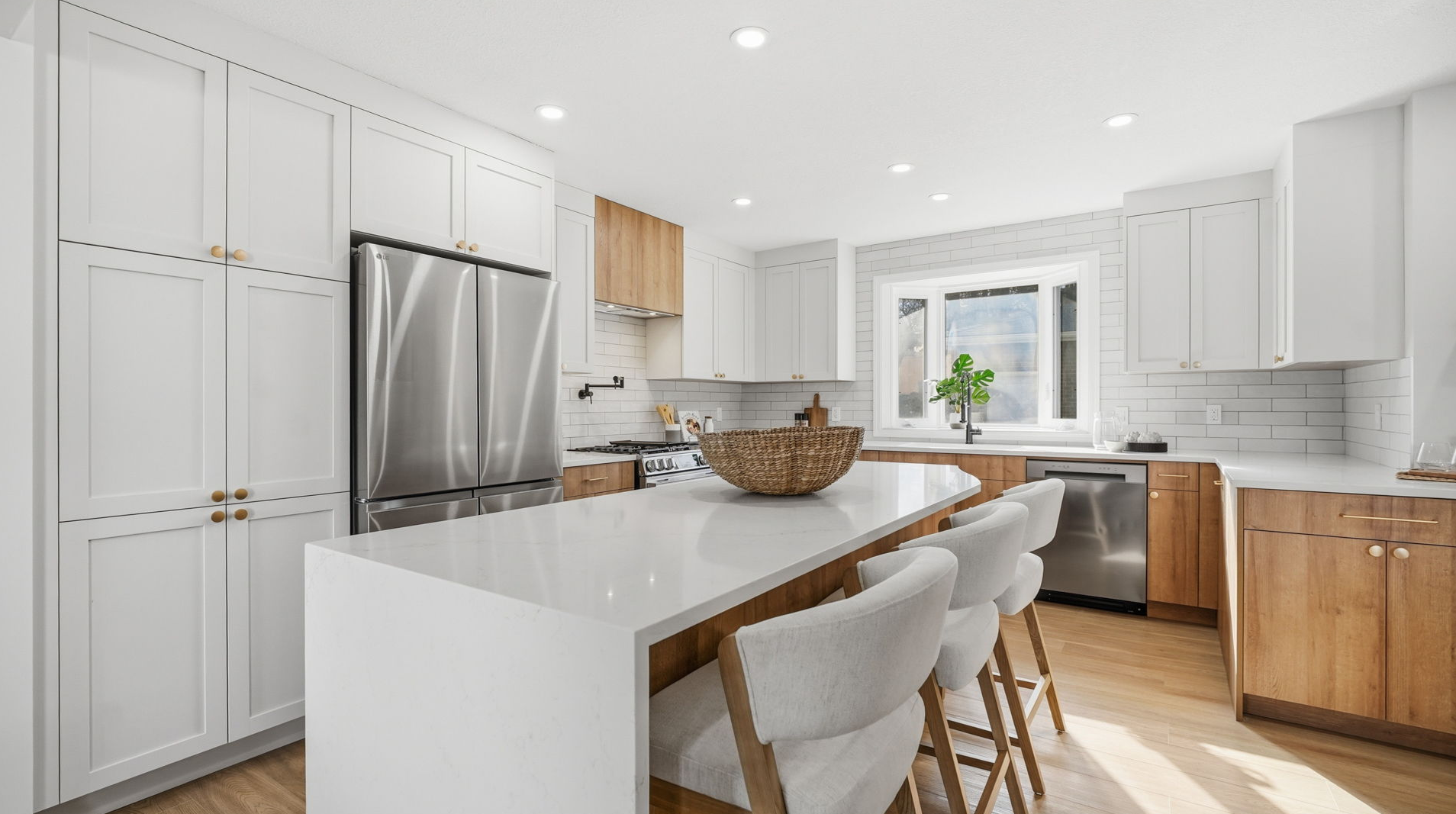 Waterfall countertops and Custom Pantry Cabinets