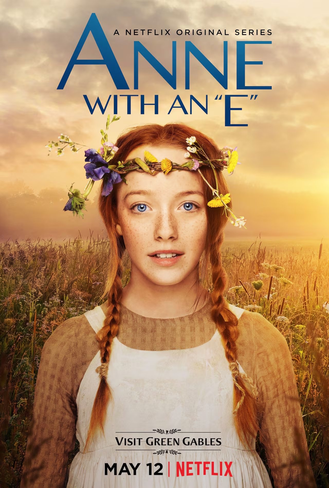 Poster for the Netflix series "Anne with an E" featuring a young girl with red hair, blue eyes, freckles, wearing a flower crown, in a field at sunset. Text at the top mentions Netflix original series, and at the bottom, it says "Visit Green Gables,"