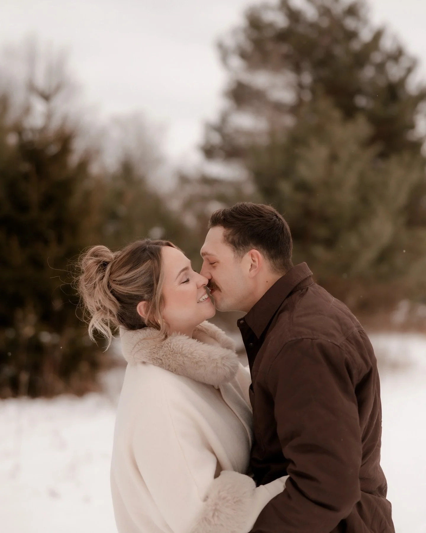 Ashley + Gunner &bull;
I cannot wait to photograph your winter wedding after getting to capture the most beautiful winter engagement session with you two. Ashley, I have to give you so much credit for wearing heels on this adventure, you were an abso